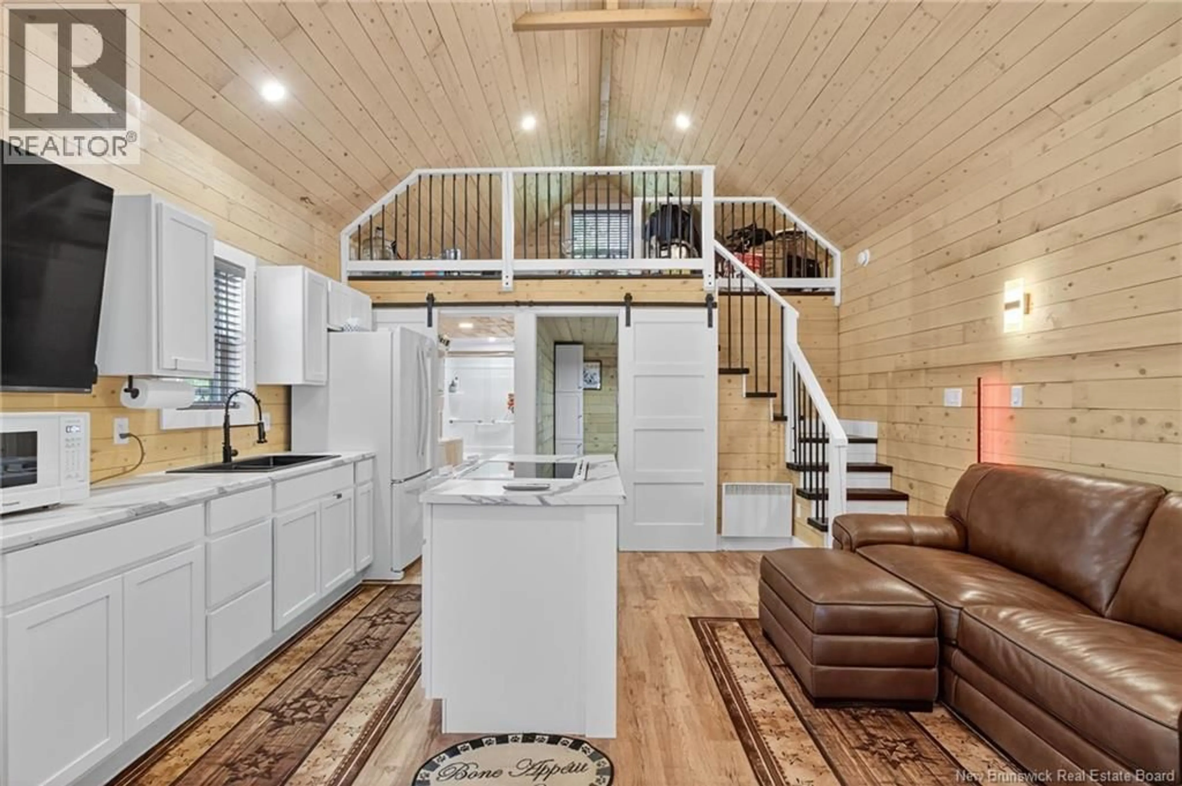 Open concept kitchen, wood/laminate floor for 4139 RTE 115, Notre-Dame New Brunswick E4V2G4