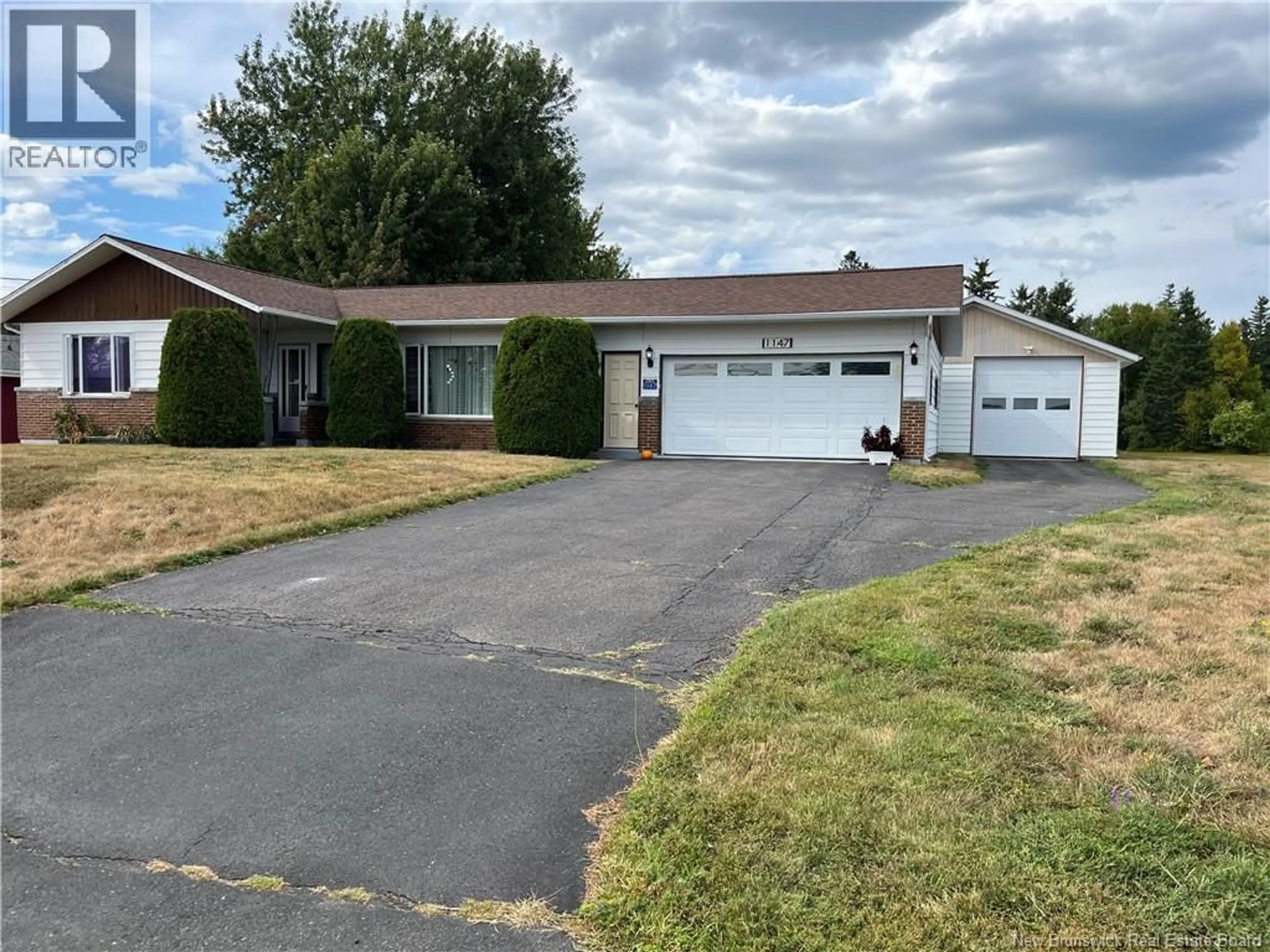 A pic from outside/outdoor area/front of a property/back of a property/a pic from drone, street for 1147 RUE FONDATEURS RUE, Paquetville New Brunswick E8R1B3