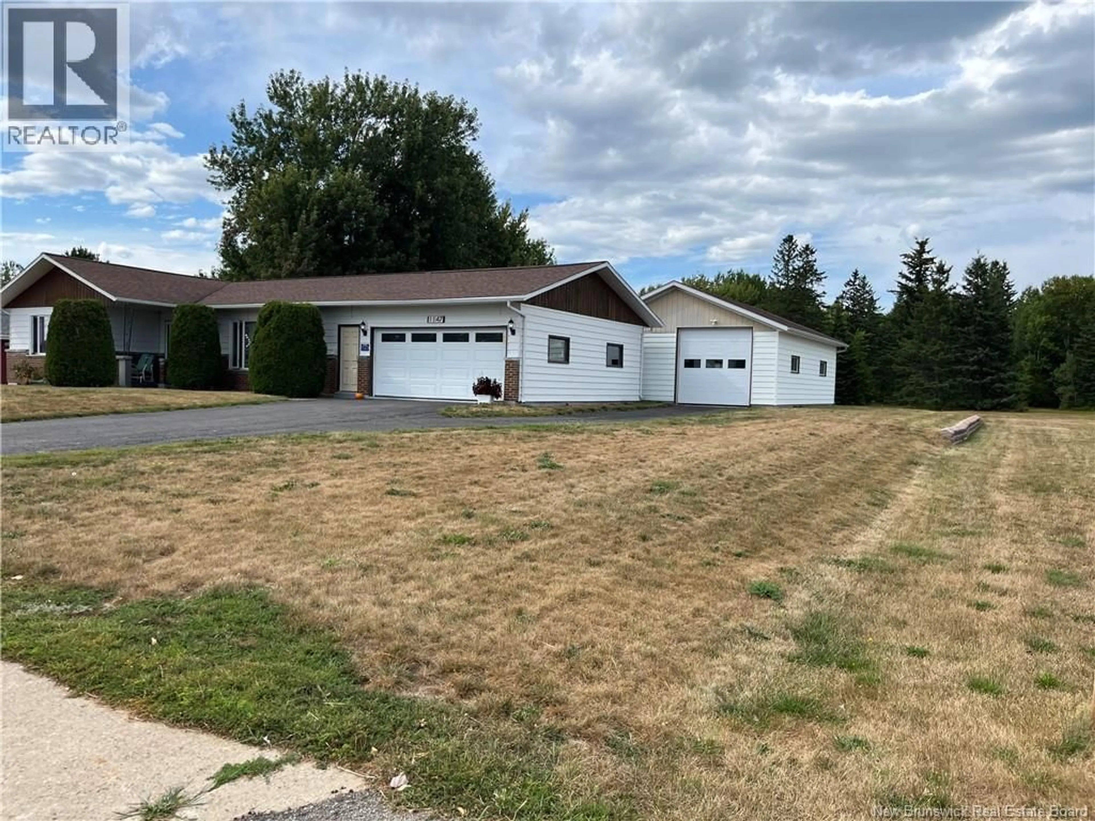 A pic from outside/outdoor area/front of a property/back of a property/a pic from drone, street for 1147 RUE FONDATEURS RUE, Paquetville New Brunswick E8R1B3