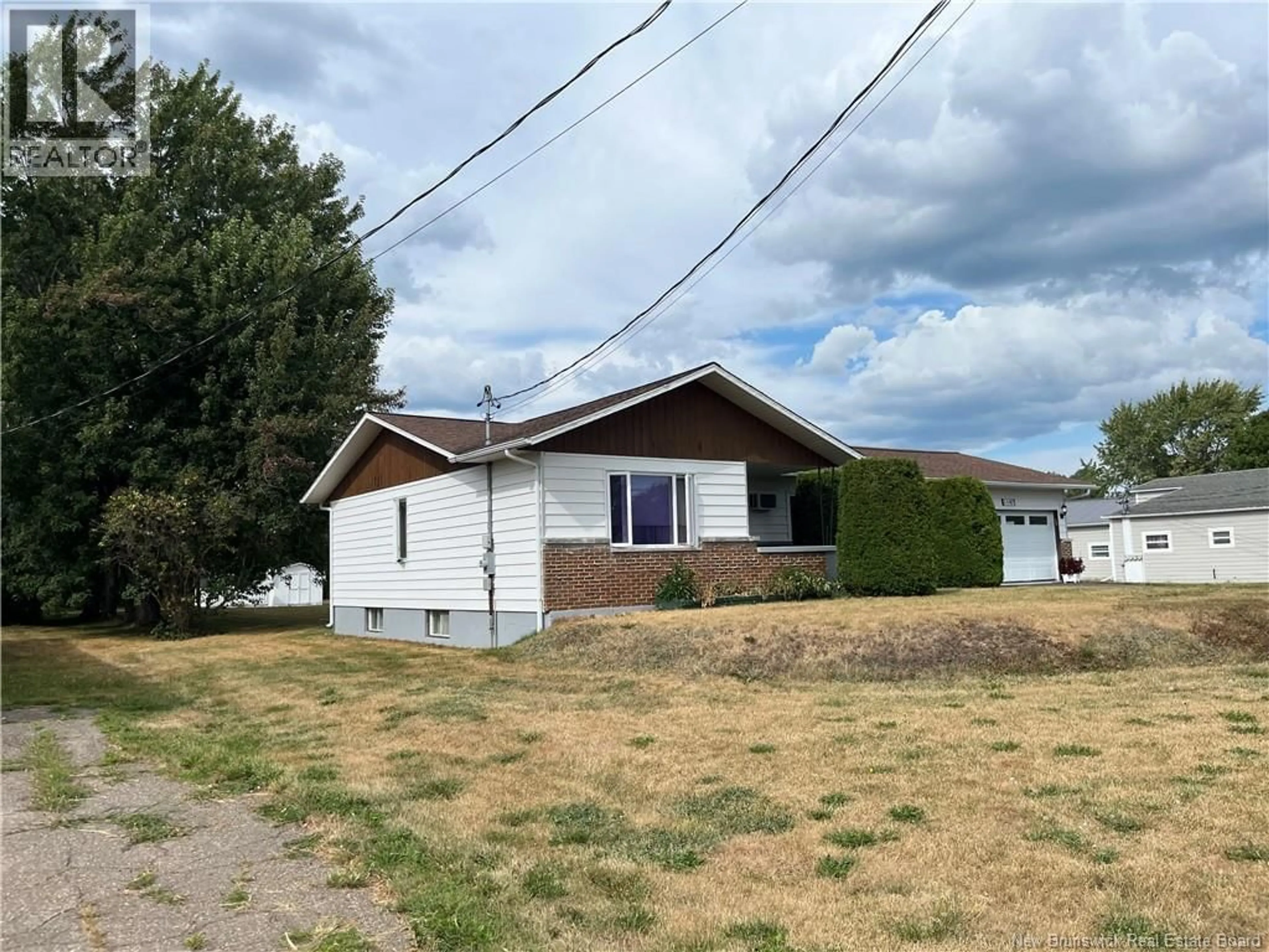 A pic from outside/outdoor area/front of a property/back of a property/a pic from drone, street for 1147 RUE FONDATEURS RUE, Paquetville New Brunswick E8R1B3