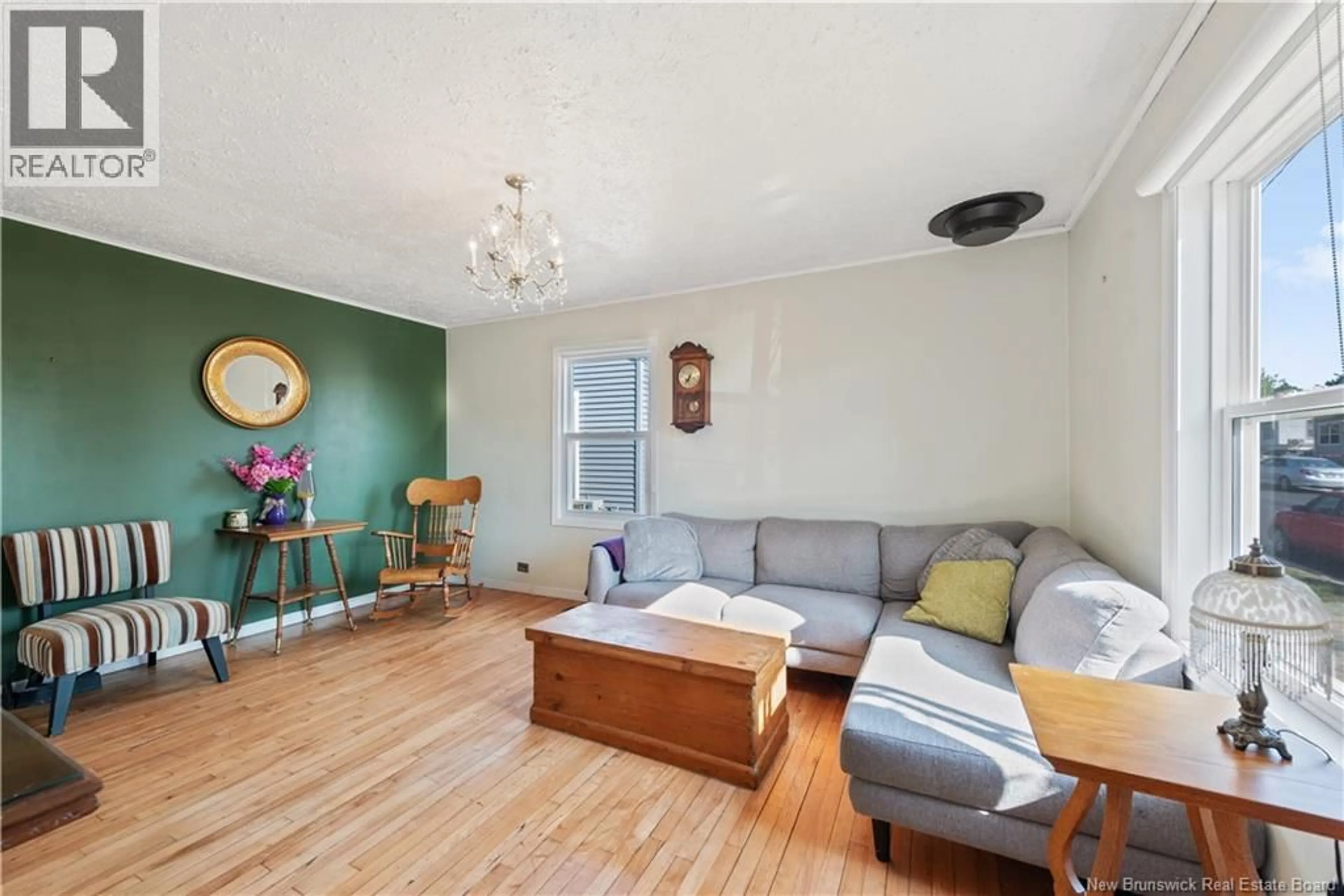 Living room with furniture, unknown for 29 COPP STREET, Dieppe New Brunswick E1A2G9