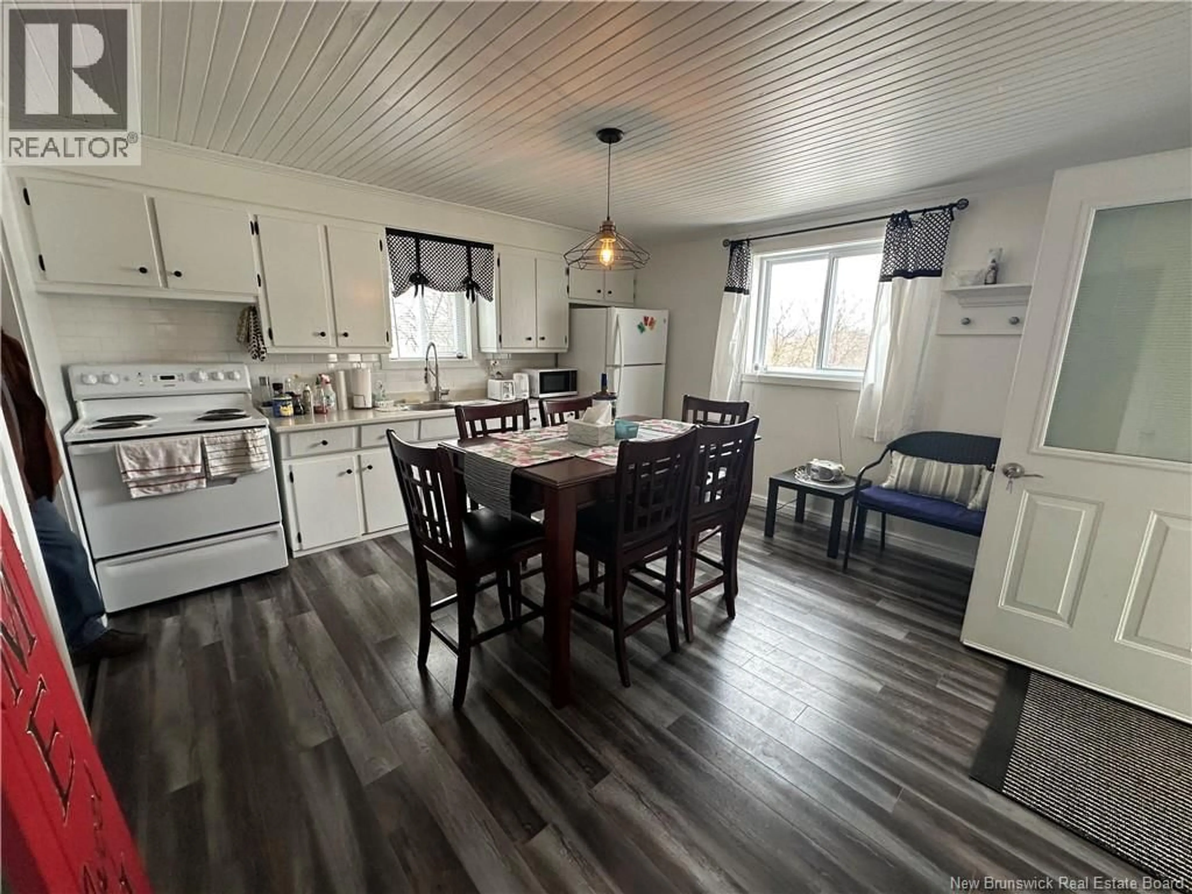 Open concept kitchen, wood/laminate floor for 213 NOTRE DAME STREET, Atholville New Brunswick E3N4T1