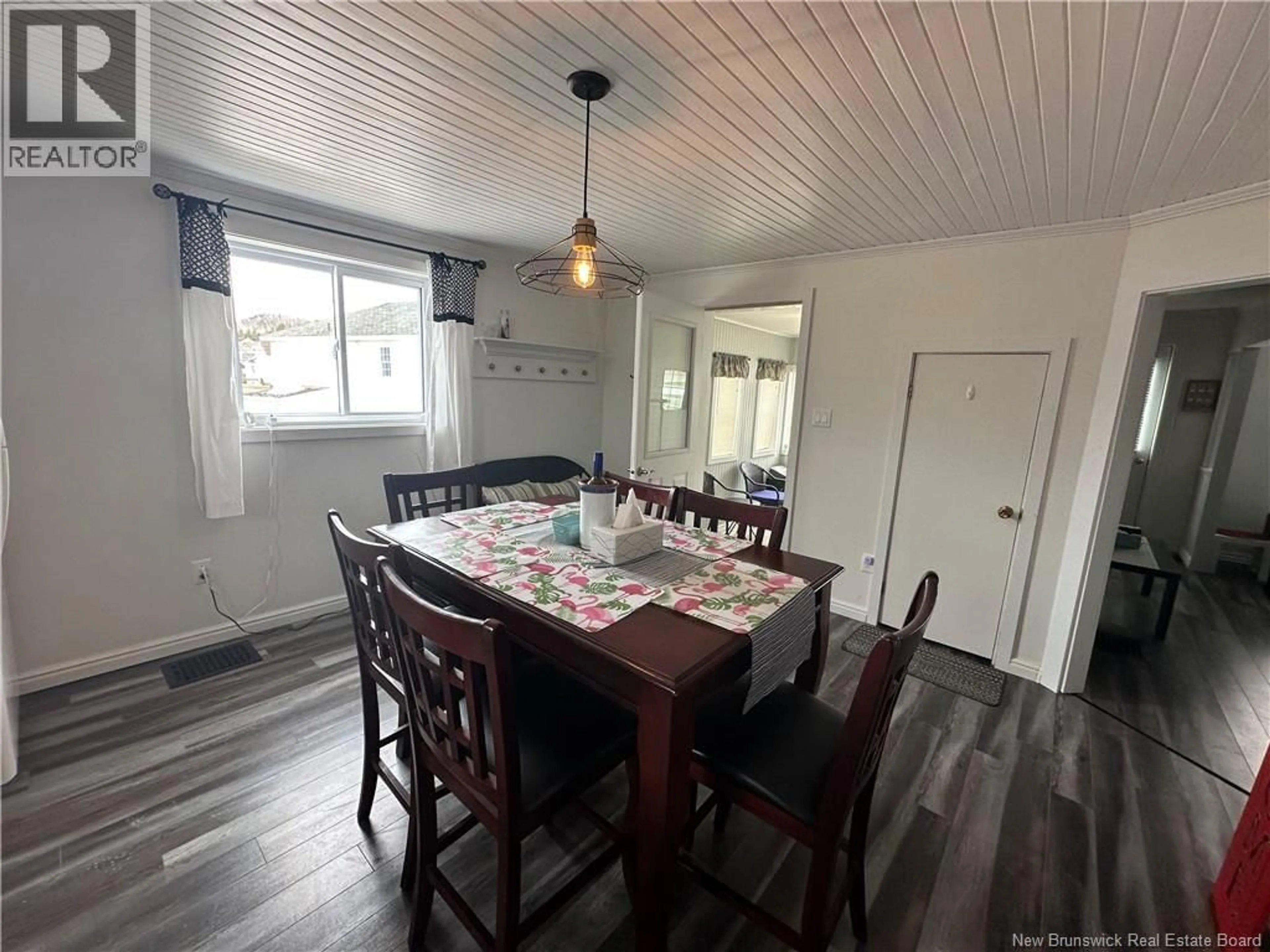 Dining room, wood/laminate floor for 213 NOTRE DAME STREET, Atholville New Brunswick E3N4T1