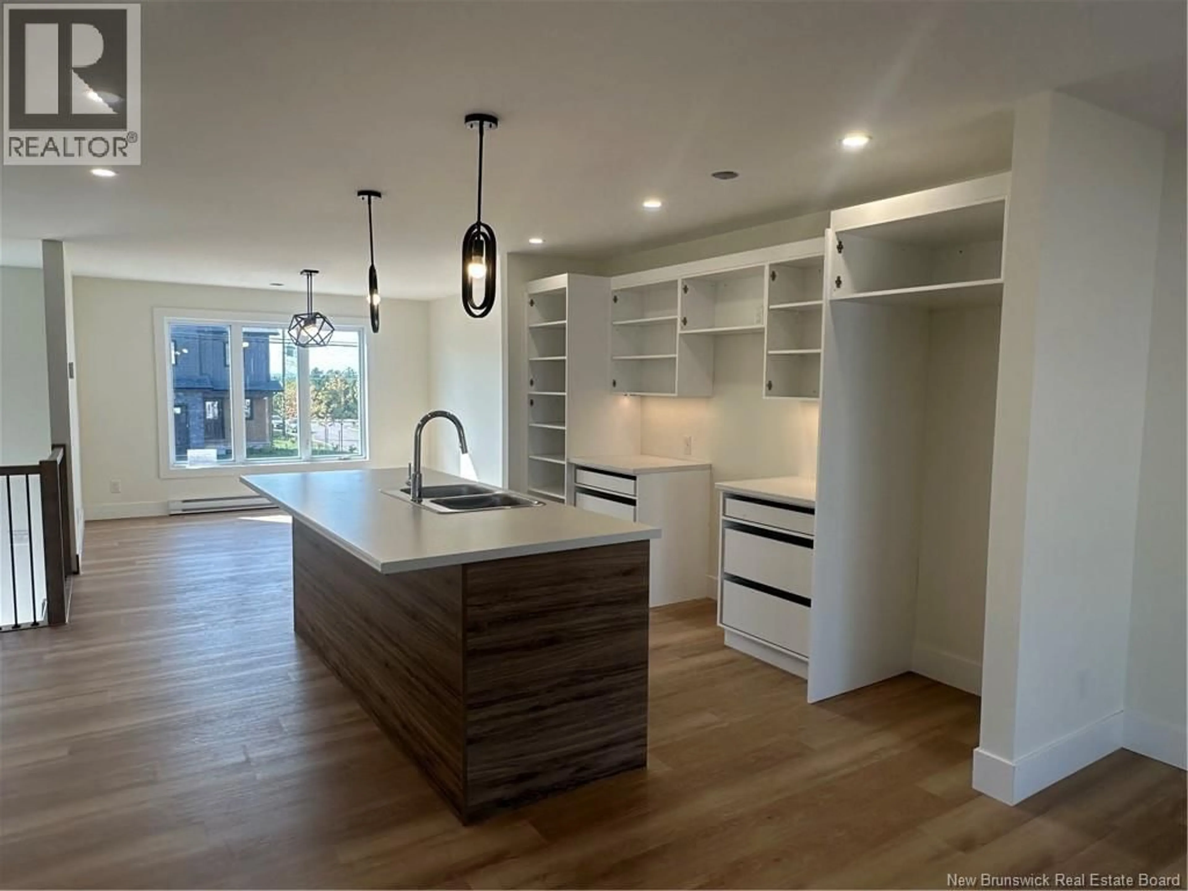 Open concept kitchen, wood/laminate floor for 78 WARNER STREET, Moncton New Brunswick E1A9X1