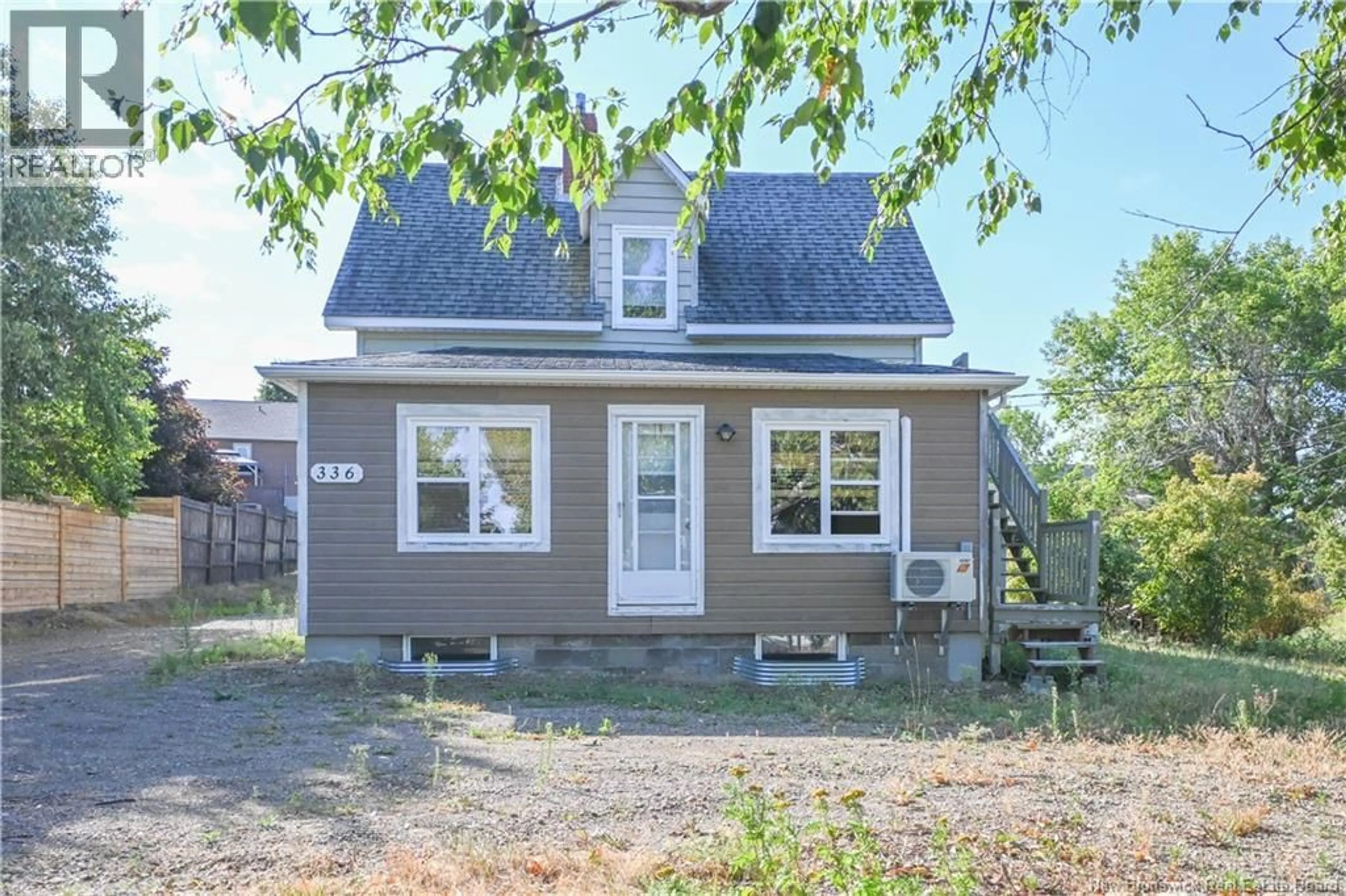 Home with vinyl exterior material, street for 336 SAINT-PIERRE BOULEVARD, Caraquet New Brunswick E1W1A3