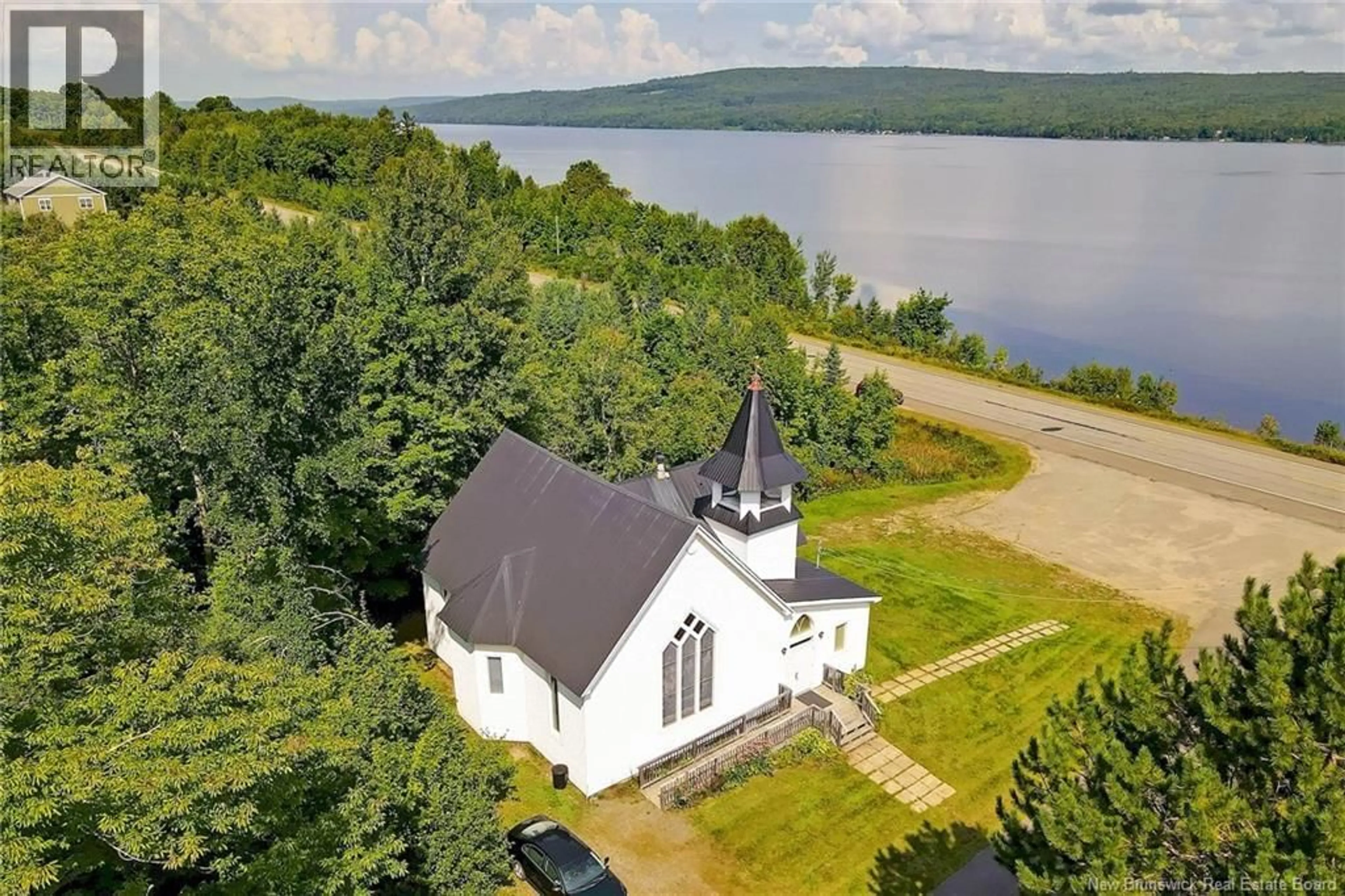 A pic from outside/outdoor area/front of a property/back of a property/a pic from drone, water/lake/river/ocean view for 6682 ROUTE 102, Prince William New Brunswick E6K3T7