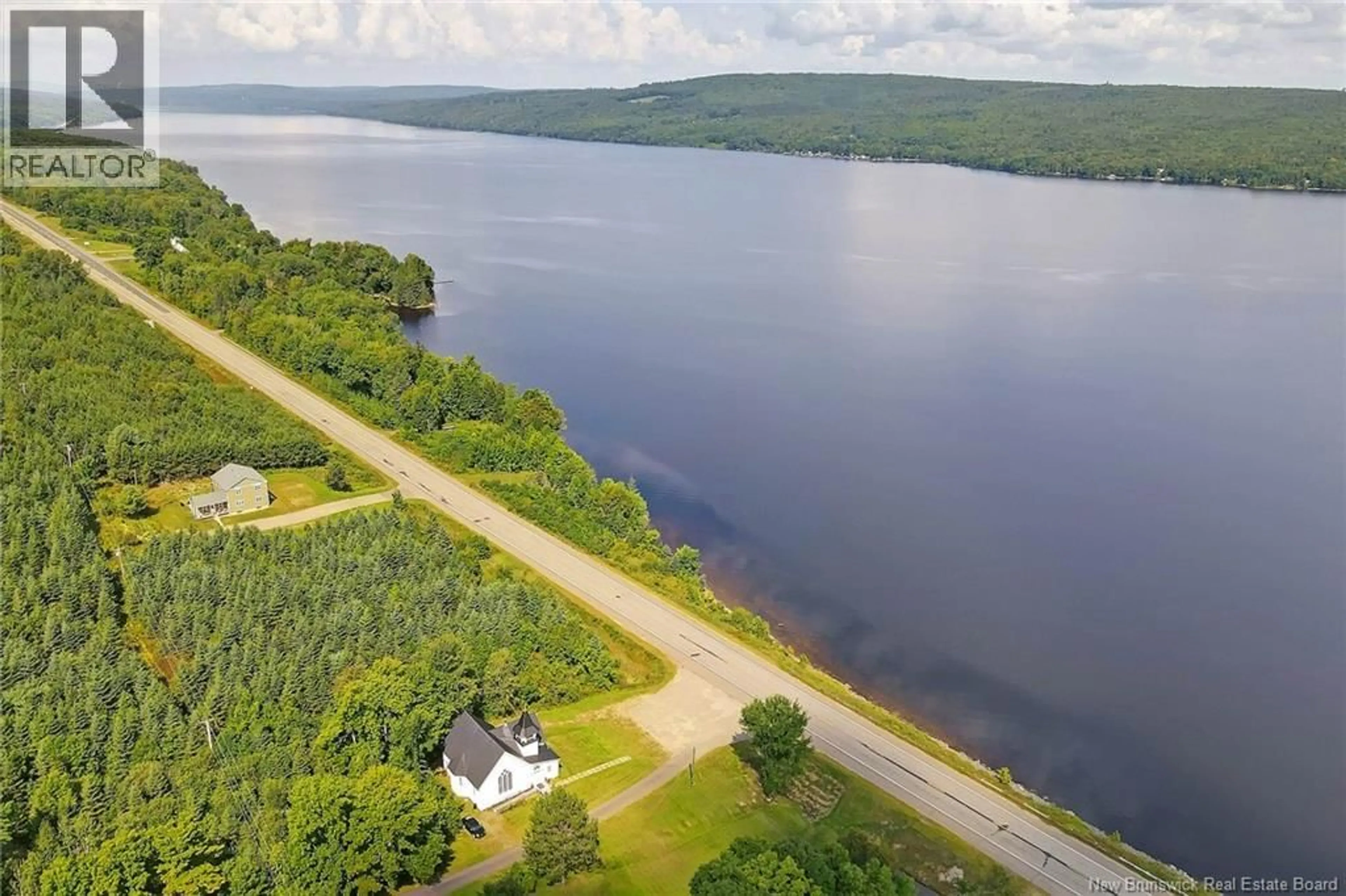 A pic from outside/outdoor area/front of a property/back of a property/a pic from drone, water/lake/river/ocean view for 6682 ROUTE 102, Prince William New Brunswick E6K3T7
