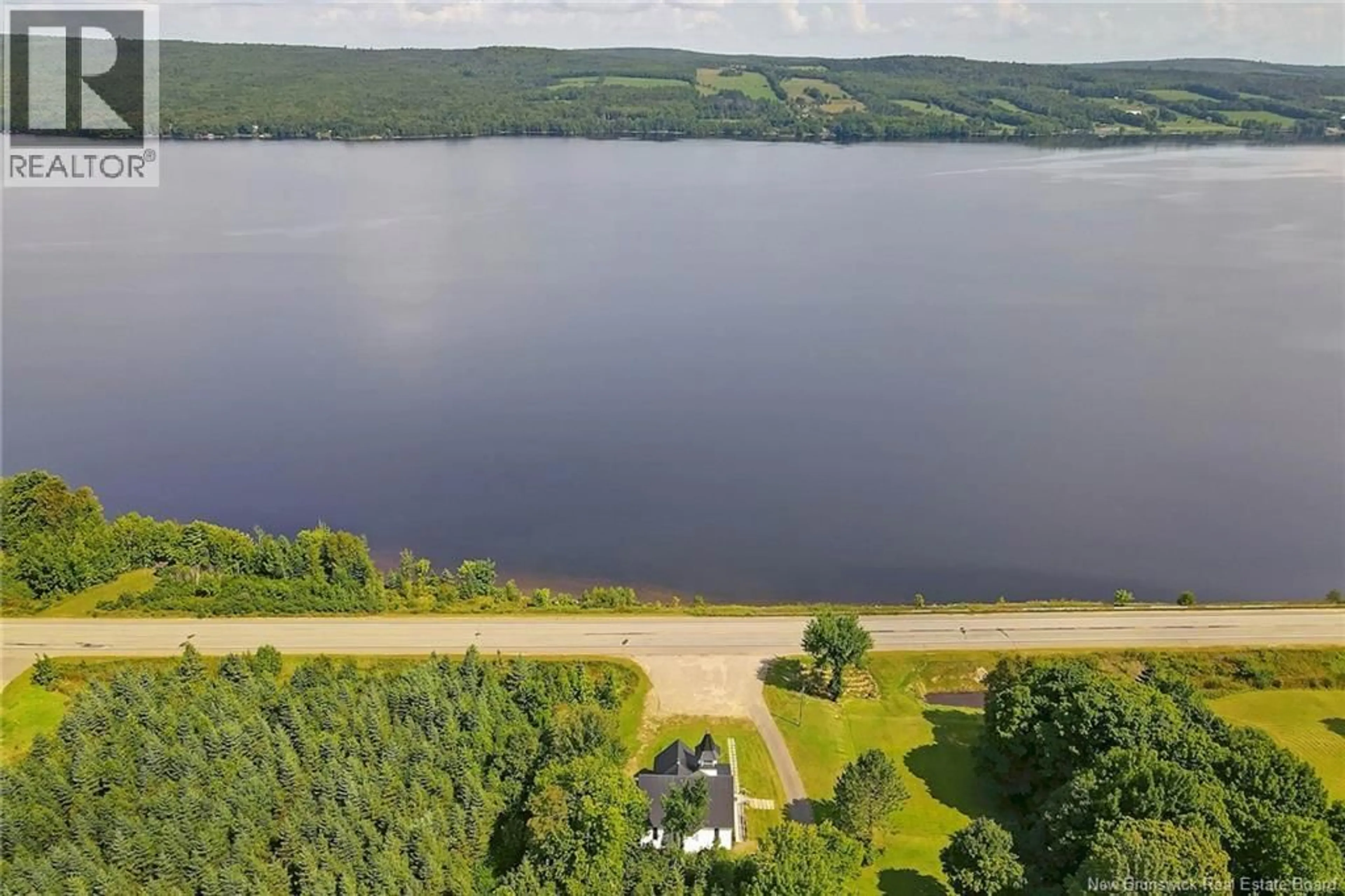 A pic from outside/outdoor area/front of a property/back of a property/a pic from drone, water/lake/river/ocean view for 6682 ROUTE 102, Prince William New Brunswick E6K3T7