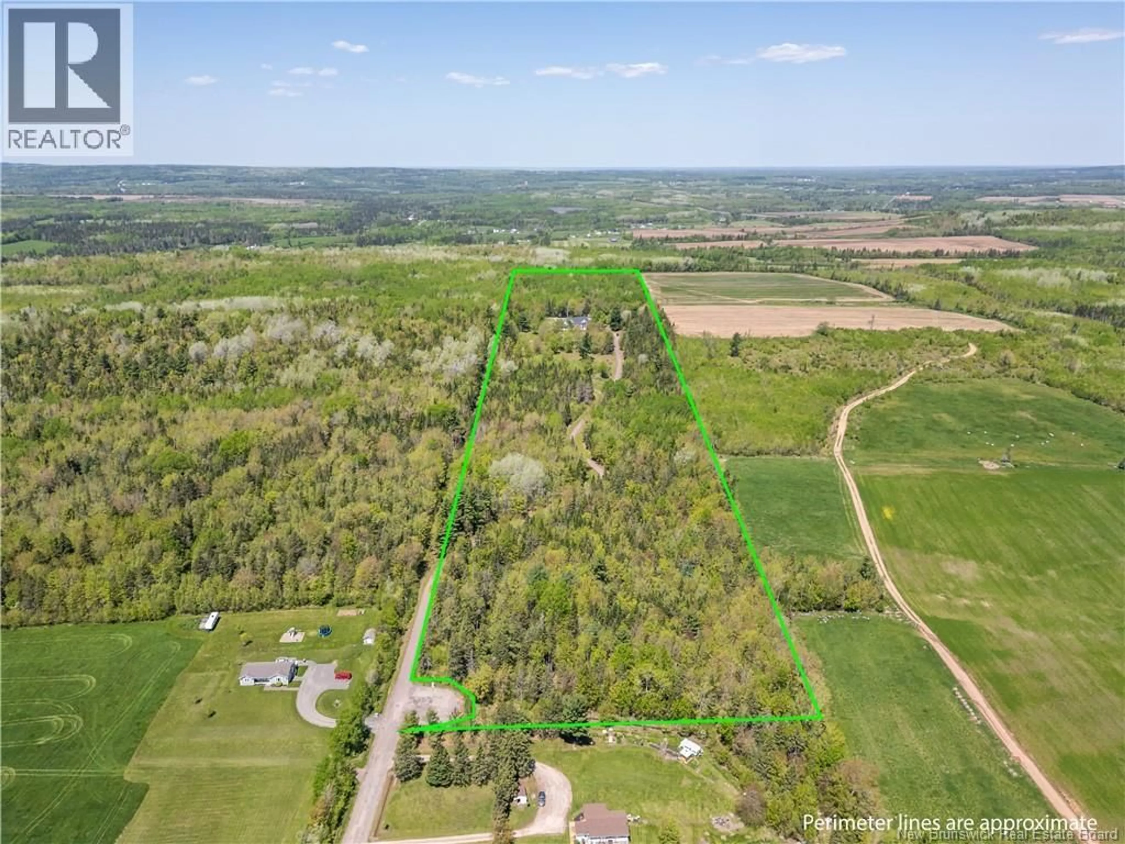 A pic from outside/outdoor area/front of a property/back of a property/a pic from drone, forest/trees view for 50 CRANDALL ROAD, Petitcodiac New Brunswick E4Z4G7