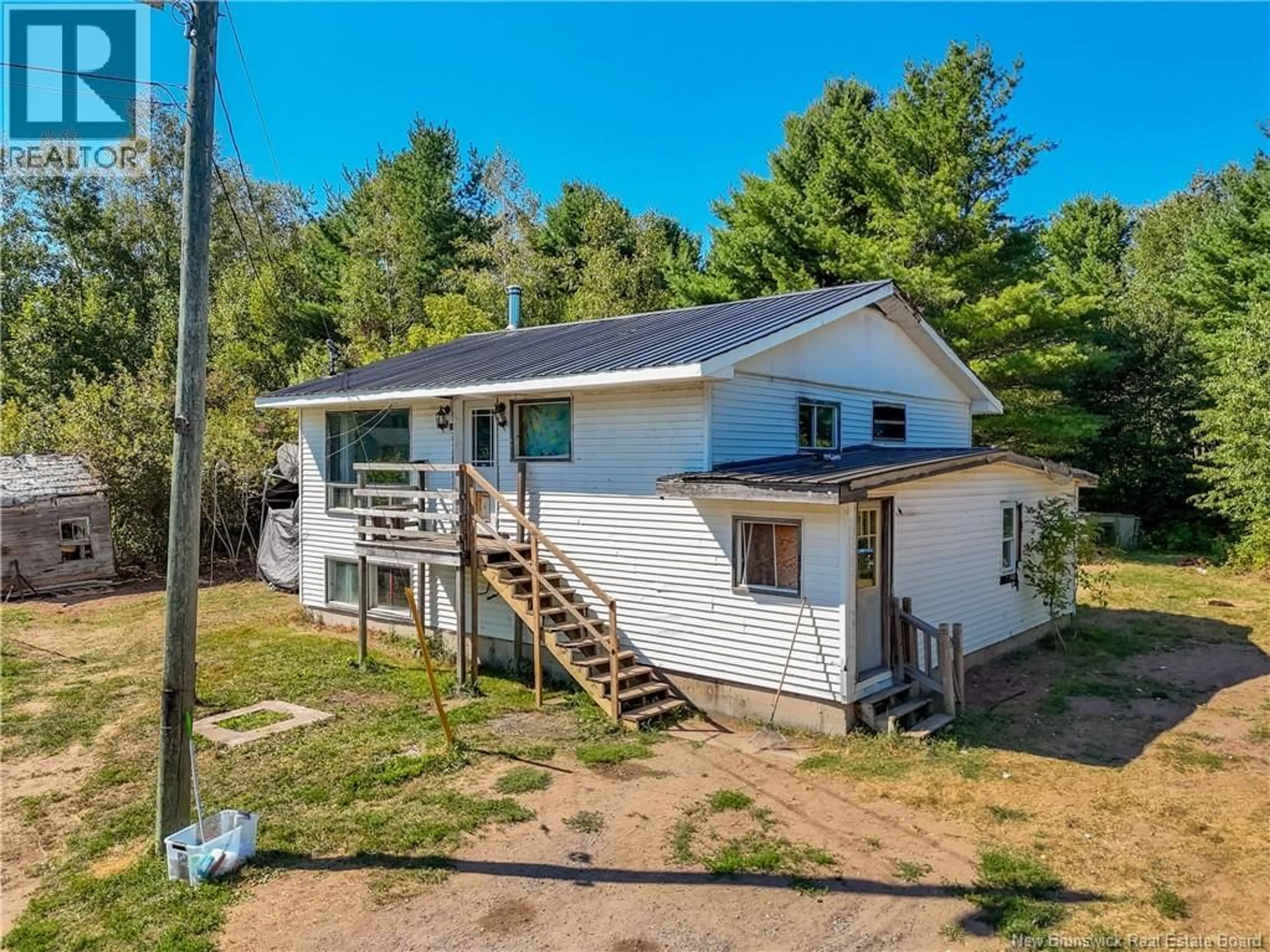 A pic from outside/outdoor area/front of a property/back of a property/a pic from drone, street for 100 RIVERSIDE DRIVE, Fredericton Junction New Brunswick E5L1V7