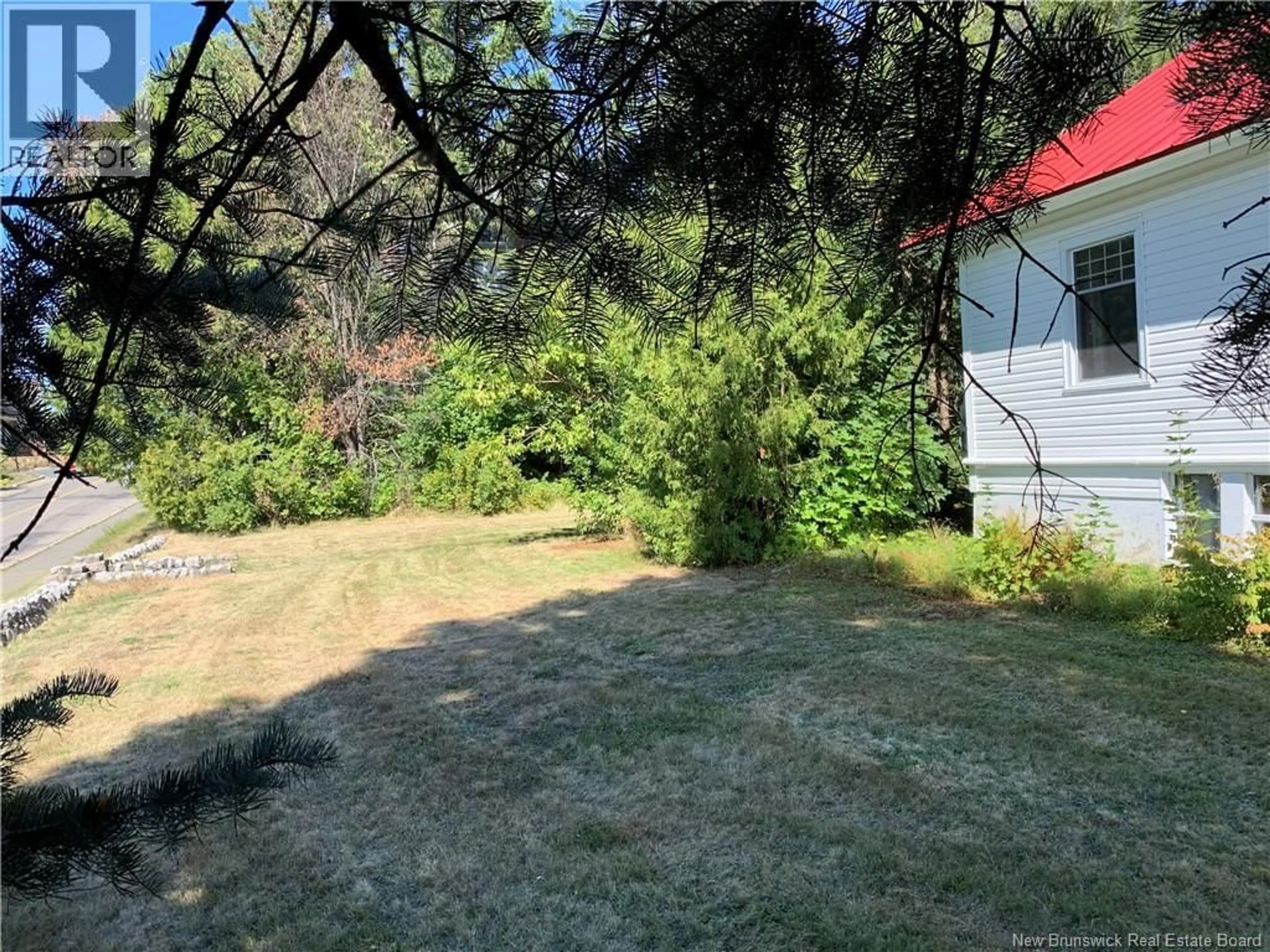 A pic from outside/outdoor area/front of a property/back of a property/a pic from drone, forest/trees view for 775 MURRAY AVENUE, Bathurst New Brunswick E2A1V3