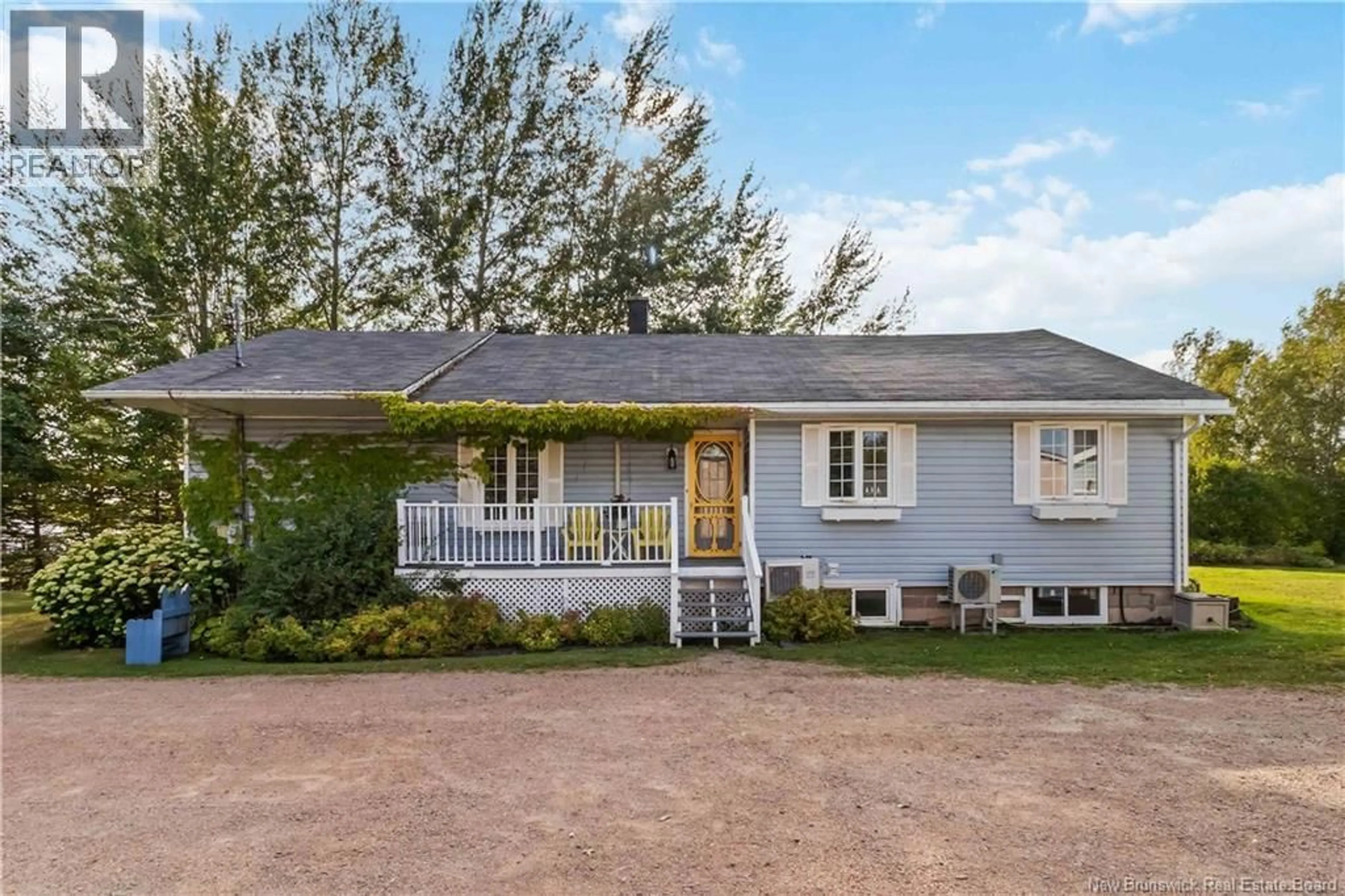 Home with vinyl exterior material, street for 892 SAINT-ANDRÉ ROAD, Saint-Andre-LeBlanc New Brunswick E4P6E9