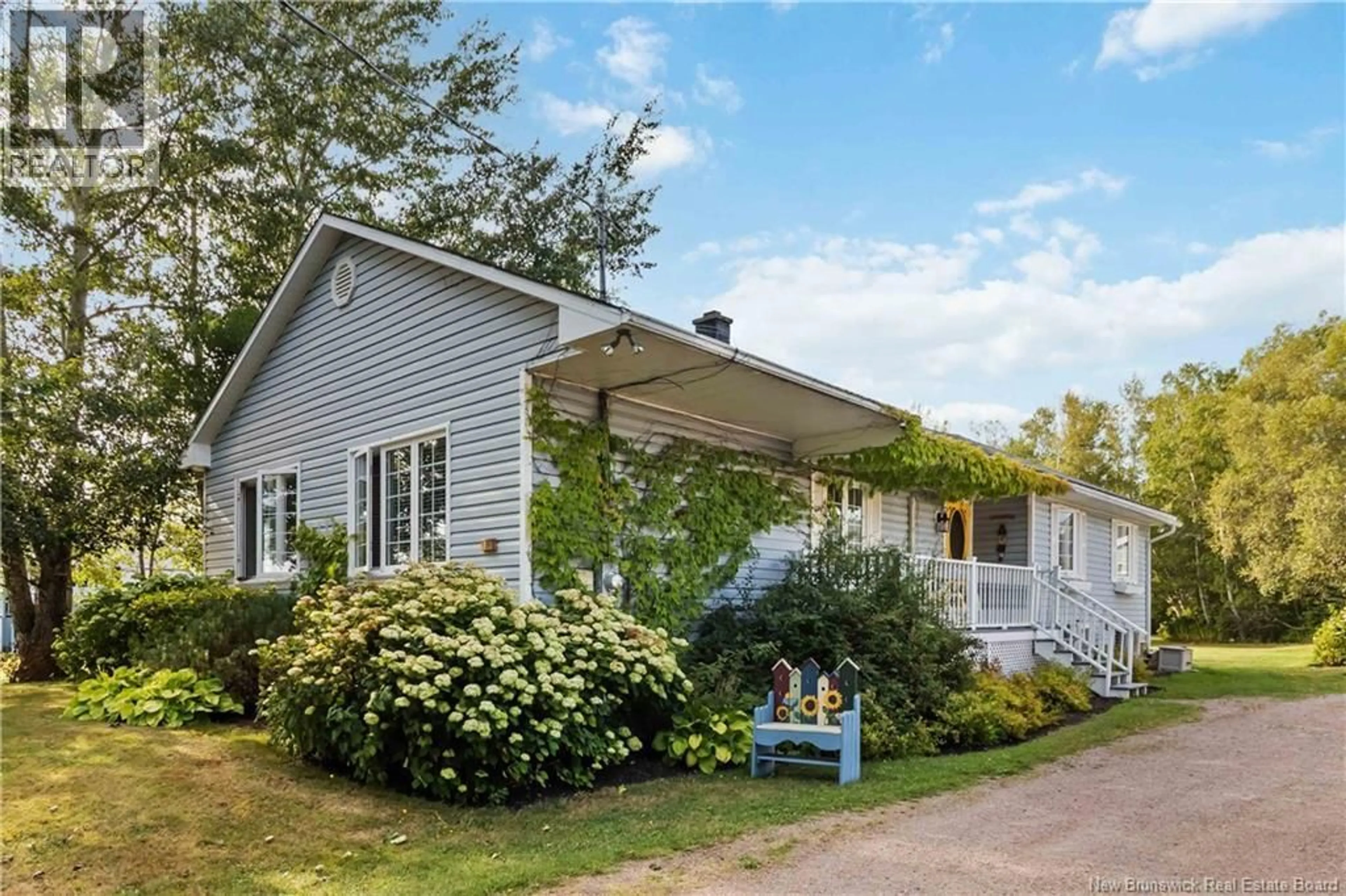 Home with vinyl exterior material, street for 892 SAINT-ANDRÉ ROAD, Saint-Andre-LeBlanc New Brunswick E4P6E9