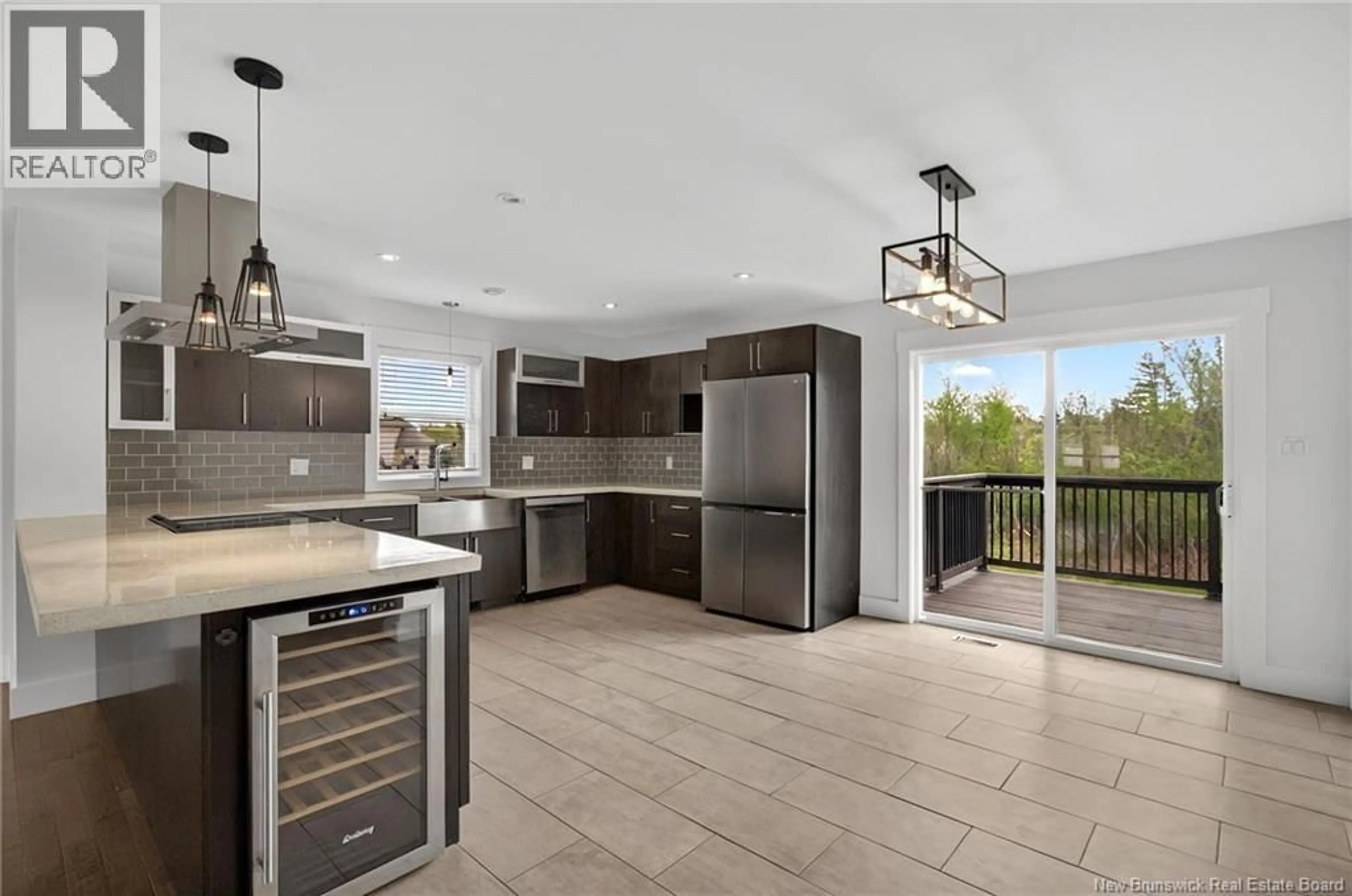 Open concept kitchen, ceramic/tile floor for 35 DORA COURT, Cap-Pelé New Brunswick E4N1C3