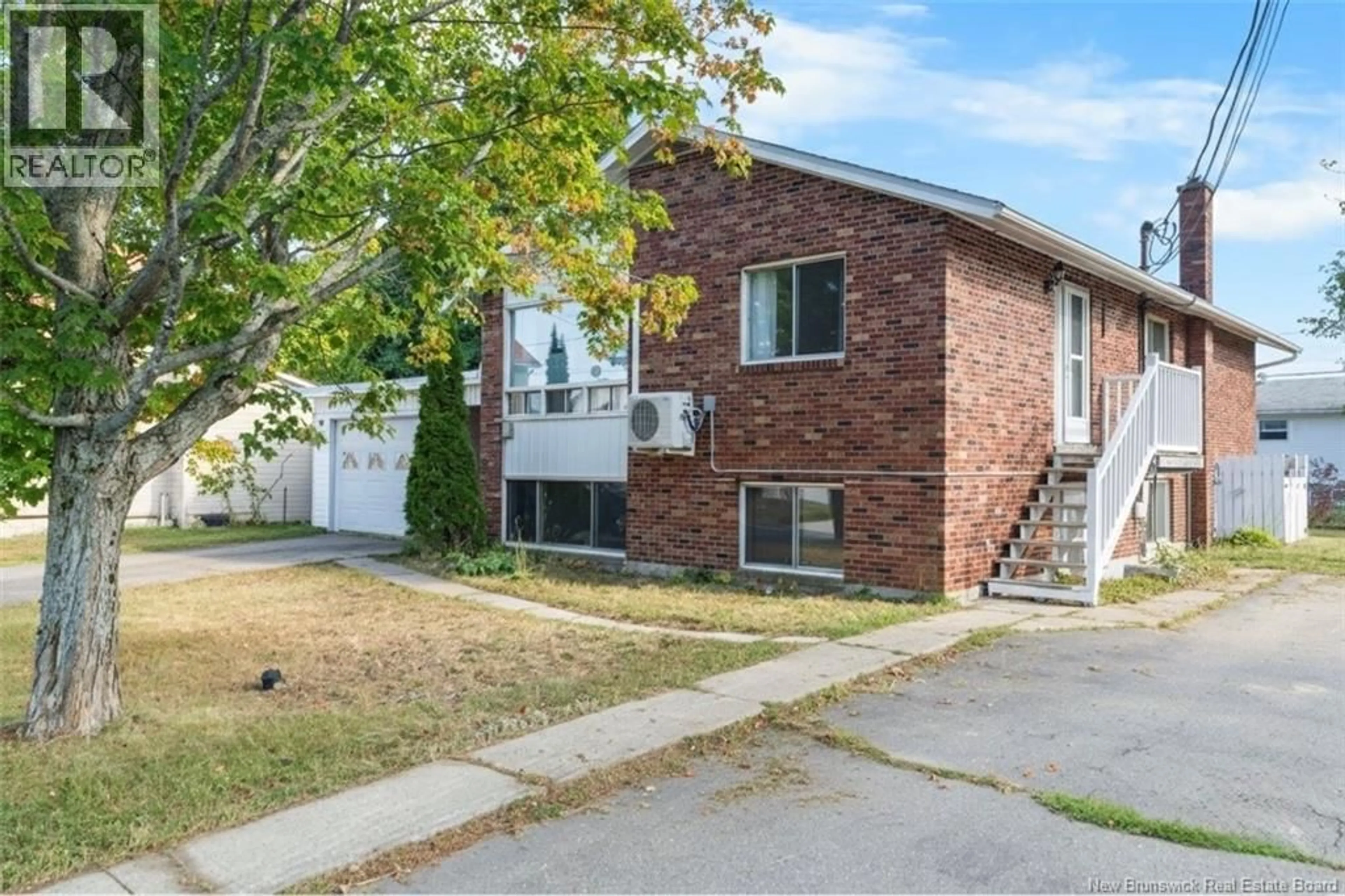 Home with brick exterior material, street for 883 LANDRY RUE, Bathurst New Brunswick E2A2V2