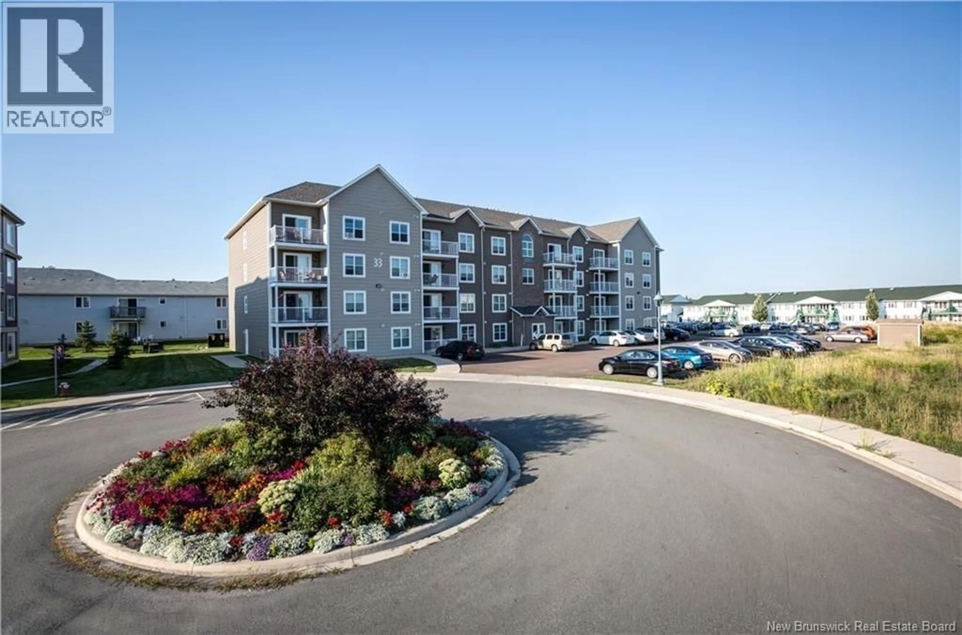 A pic from outside/outdoor area/front of a property/back of a property/a pic from drone, water/lake/river/ocean view for 407 - 33 SIFROI STREET, Dieppe New Brunswick E1A5T1