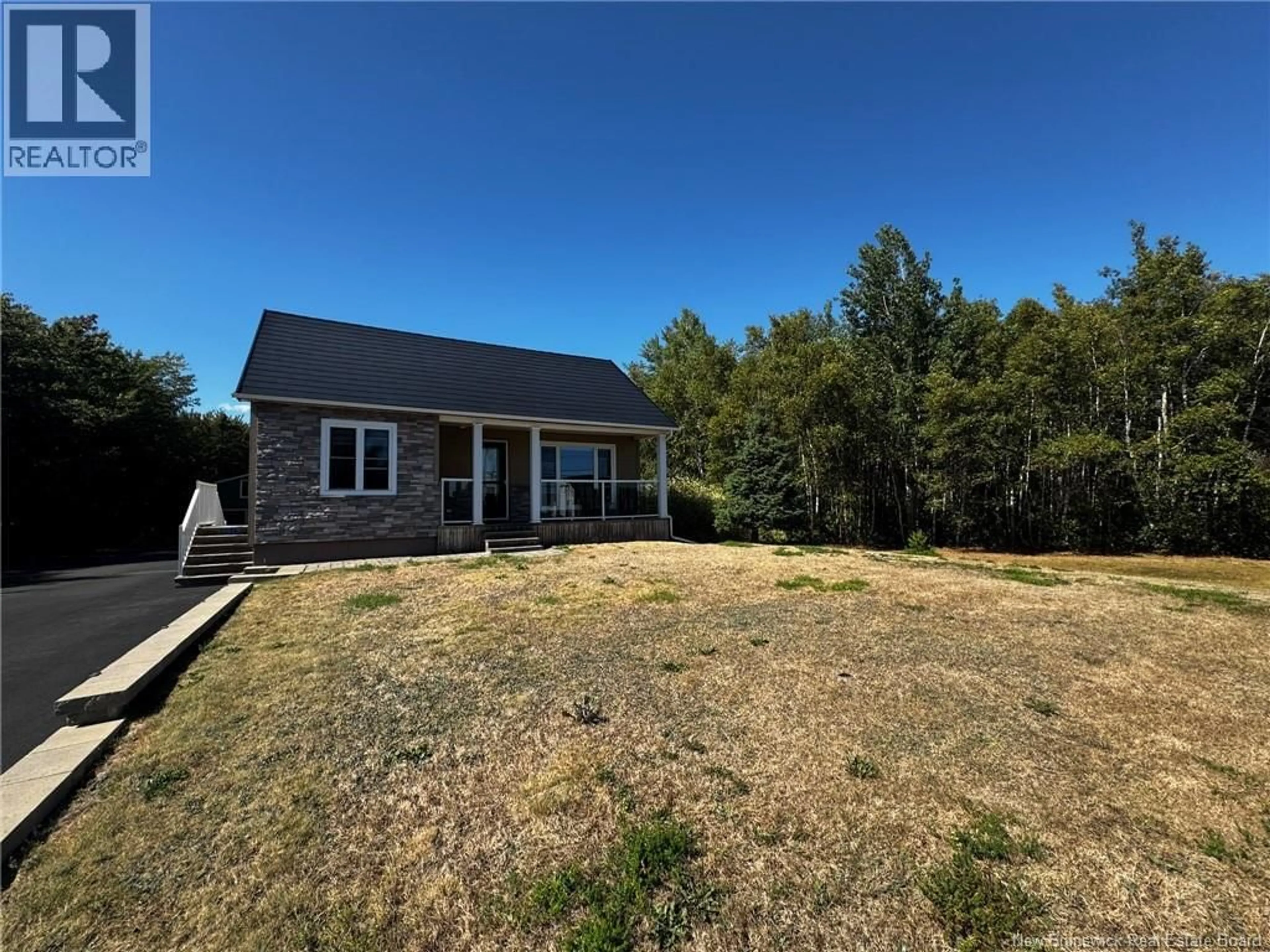A pic from outside/outdoor area/front of a property/back of a property/a pic from drone, unknown for 1015 PRINCIPALE STREET, Neguac New Brunswick E9G4K3