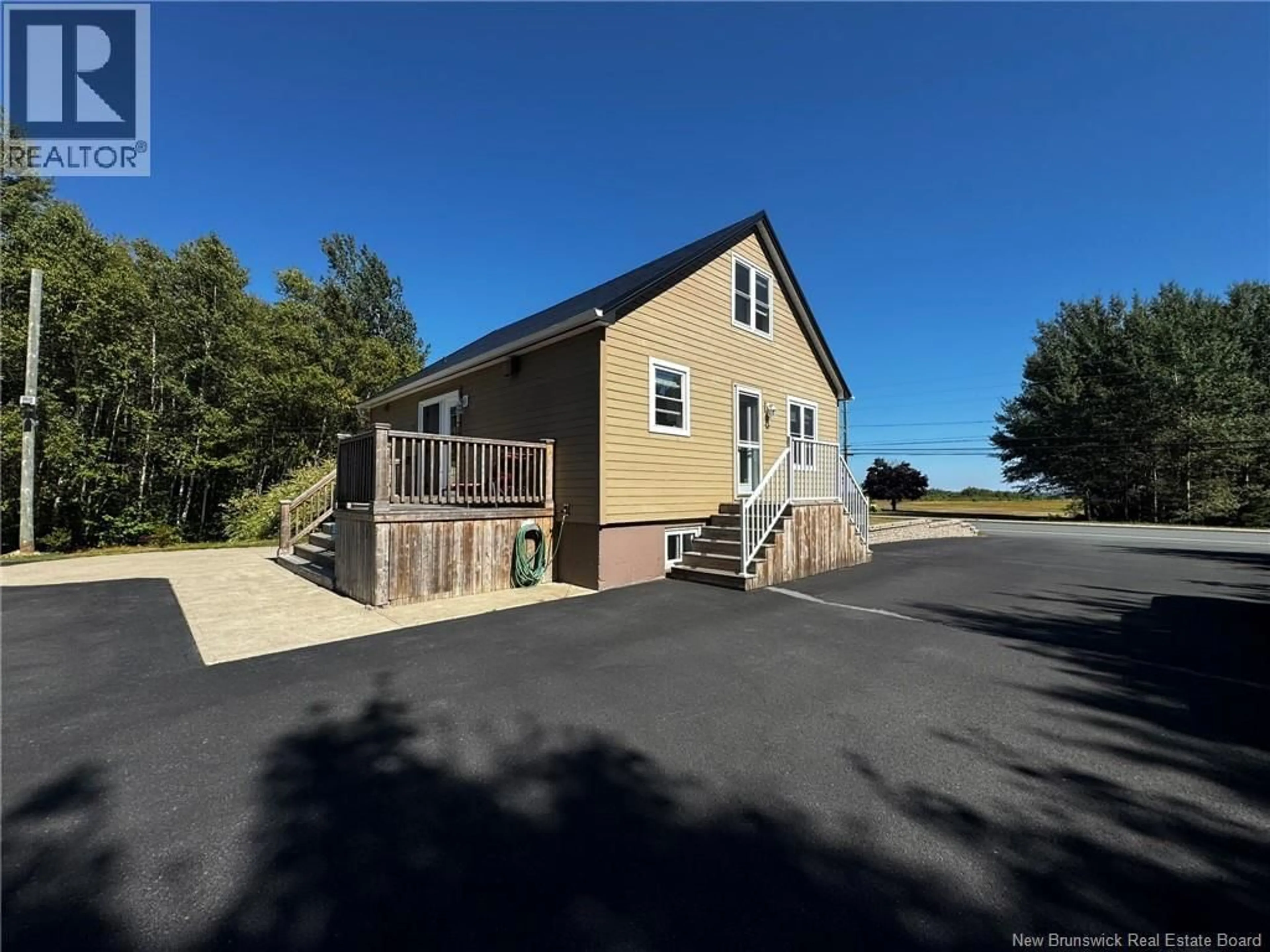 A pic from outside/outdoor area/front of a property/back of a property/a pic from drone, water/lake/river/ocean view for 1015 PRINCIPALE STREET, Neguac New Brunswick E9G4K3