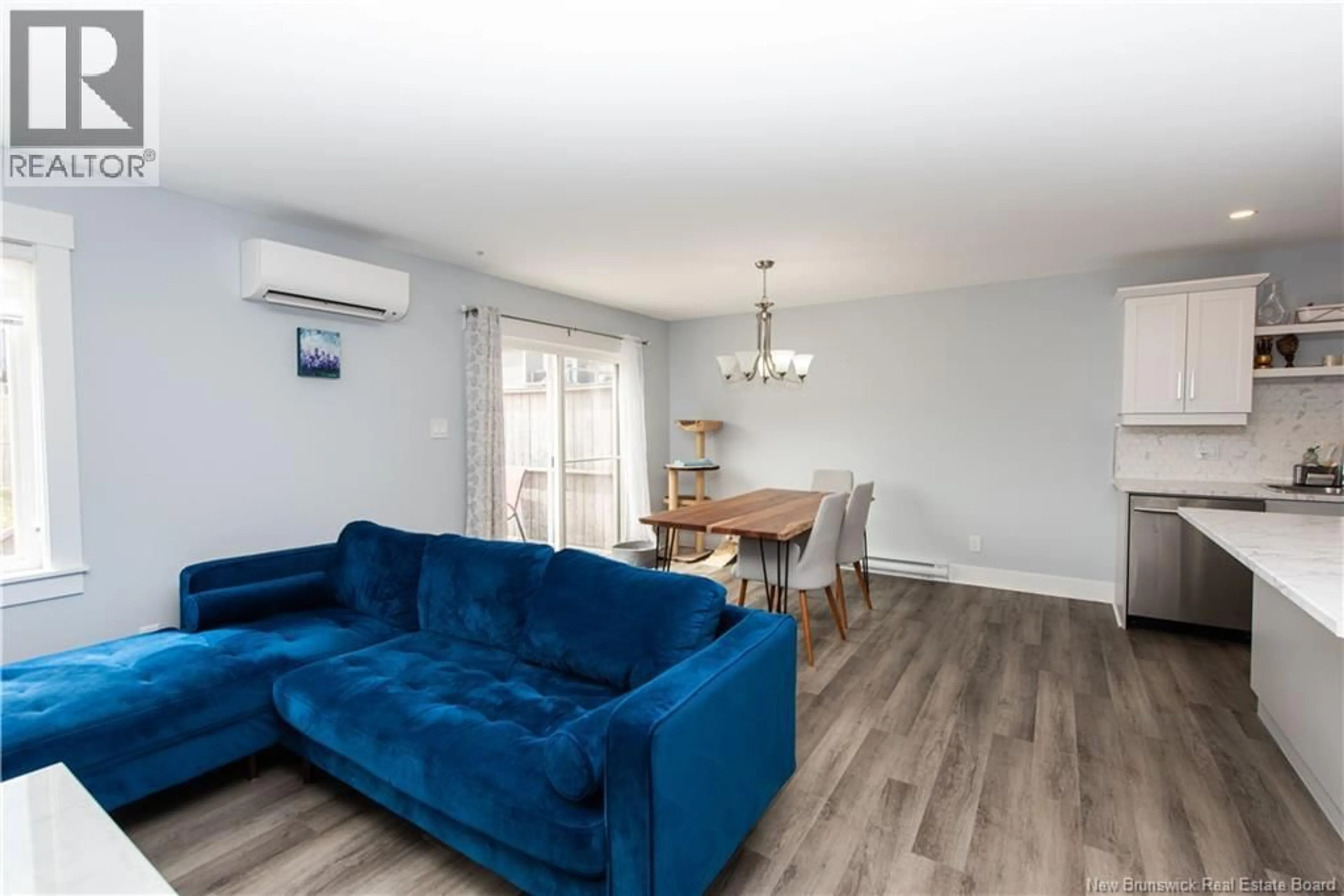 Living room with furniture, wood/laminate floor for 24 SATLEVILLE, Riverview New Brunswick E1B0W2