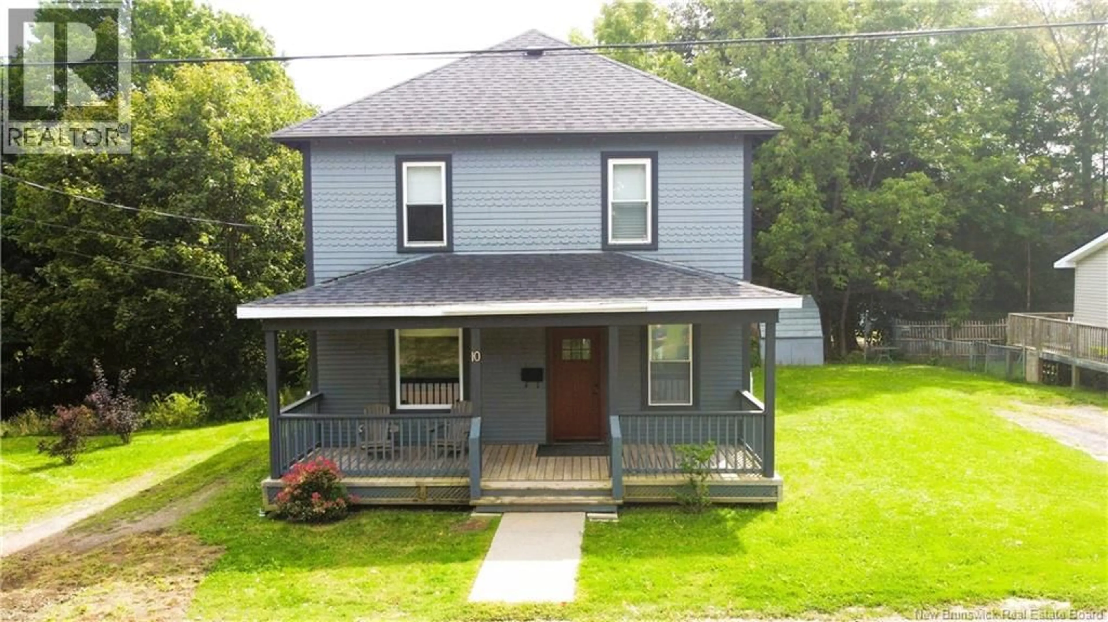 Home with vinyl exterior material, street for 10 DOW STREET, St. Stephen New Brunswick E3L1R3