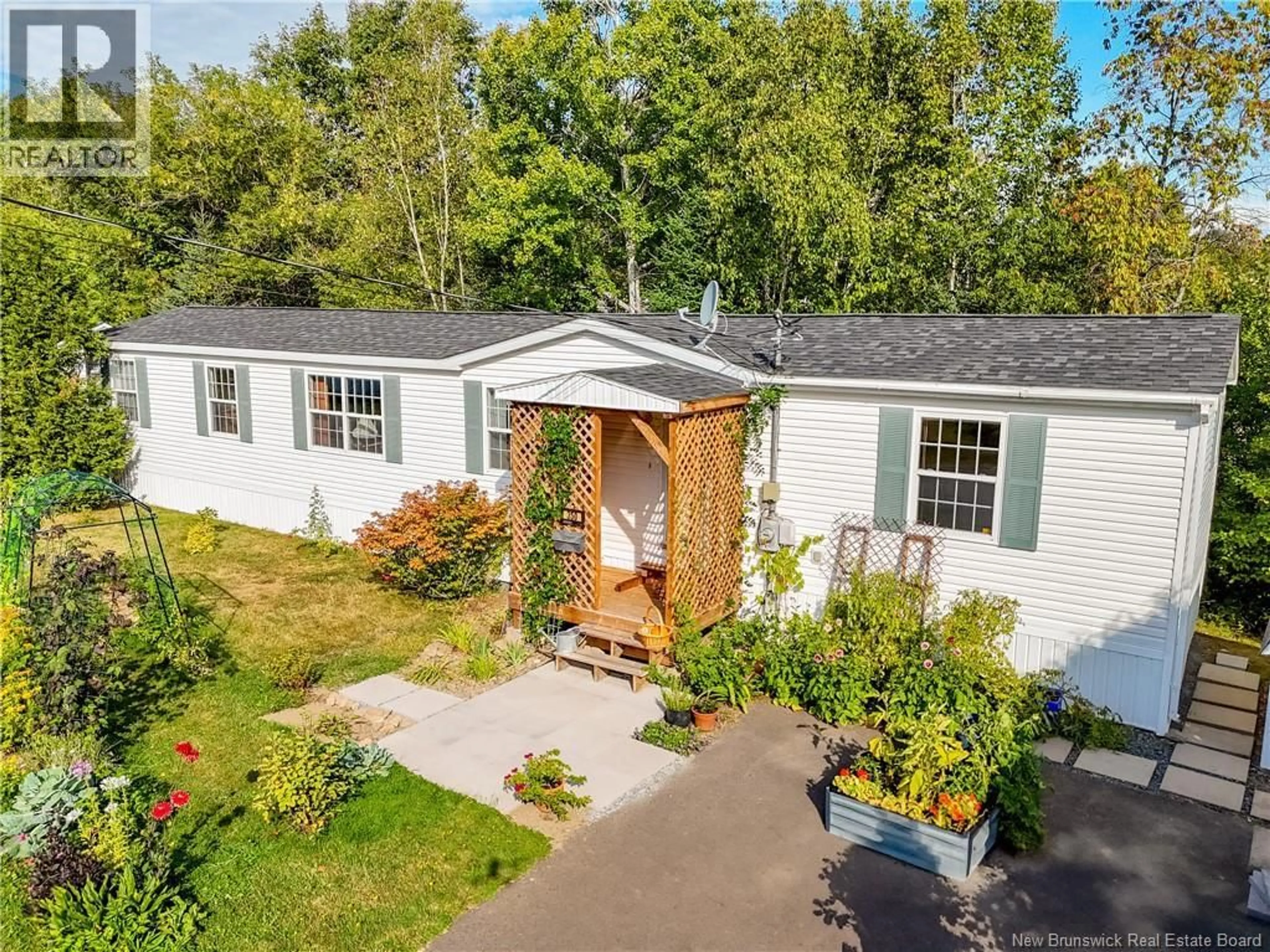 A pic from outside/outdoor area/front of a property/back of a property/a pic from drone, street for 350 GOVERNOR LANE, Fredericton New Brunswick E3B7L1