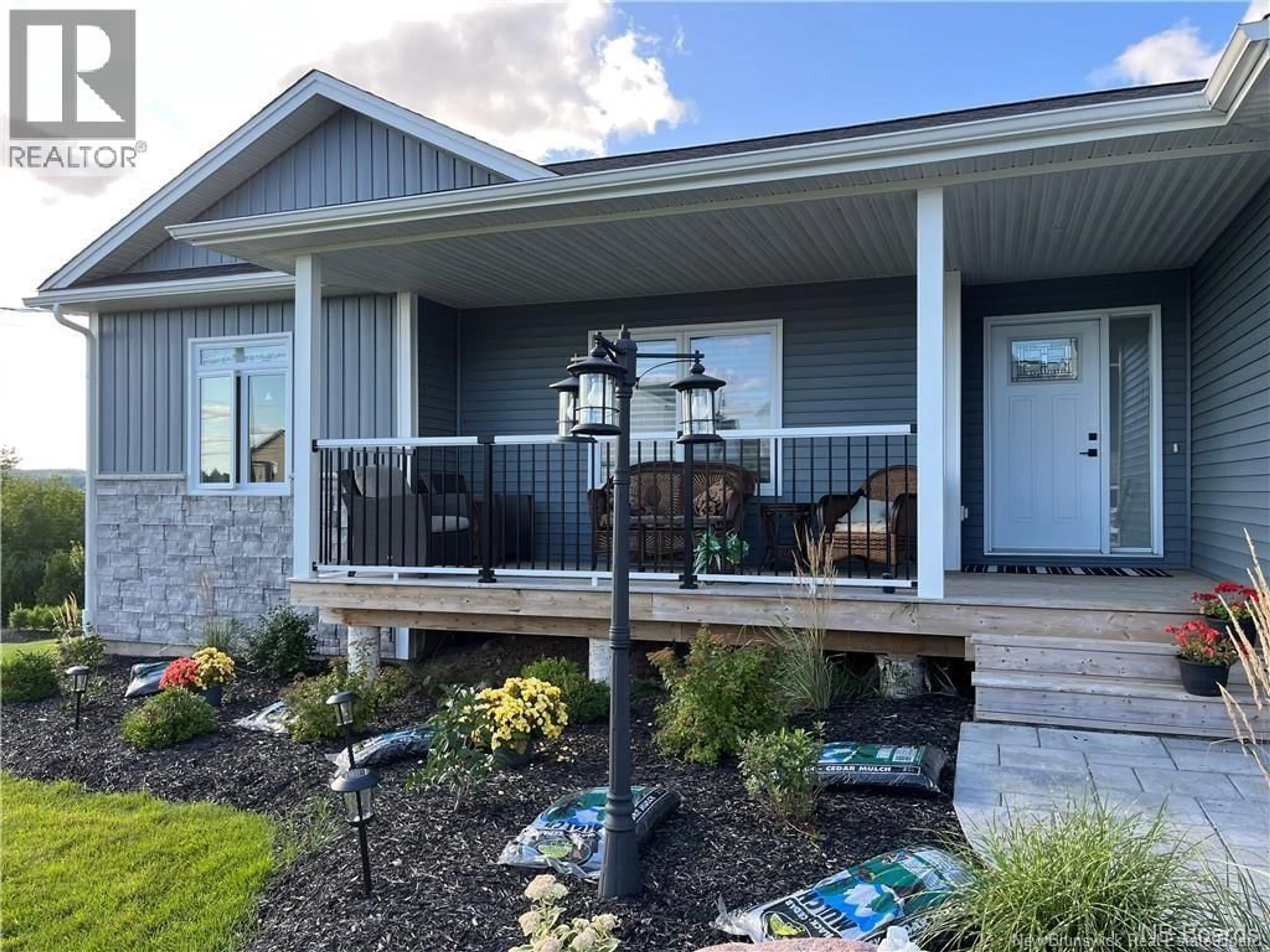 Home with vinyl exterior material, street for 9 FLAGSTONE DRIVE, Quispamsis New Brunswick E2G0B6