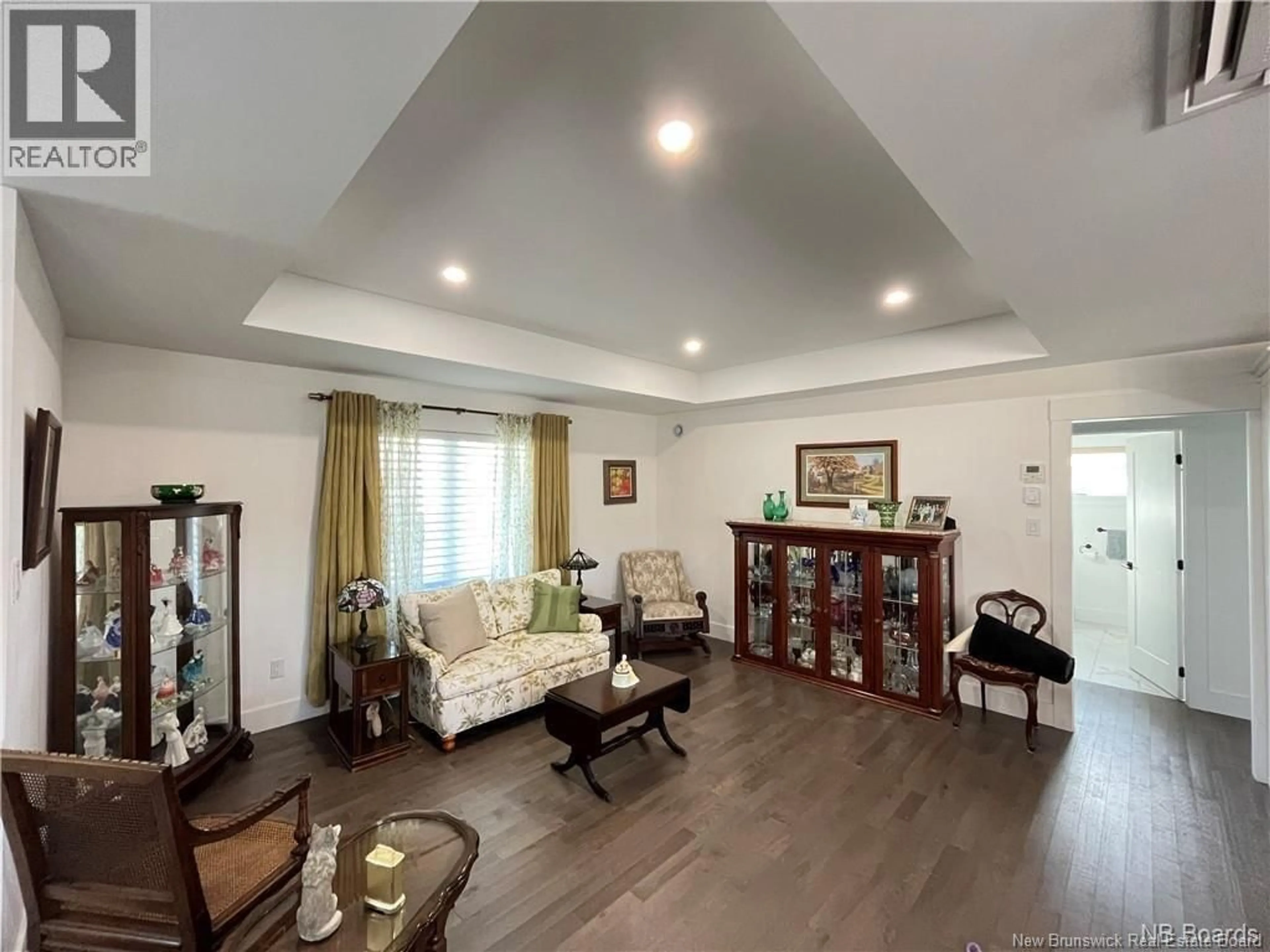 Living room with furniture, wood/laminate floor for 9 FLAGSTONE DRIVE, Quispamsis New Brunswick E2G0B6