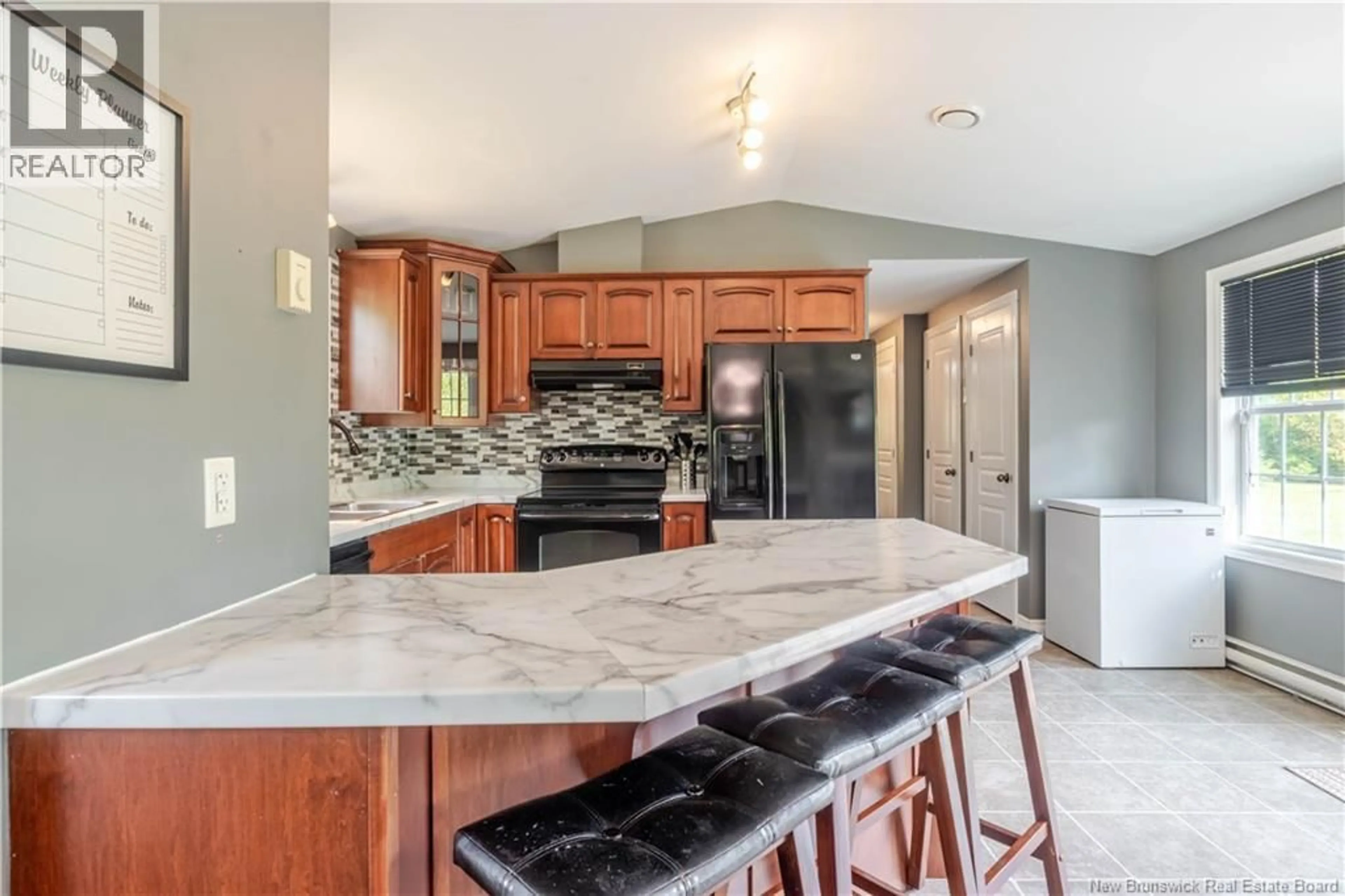 Open concept kitchen, ceramic/tile floor for 16 LAWLER STREET, Rusagonis New Brunswick E3B0N5