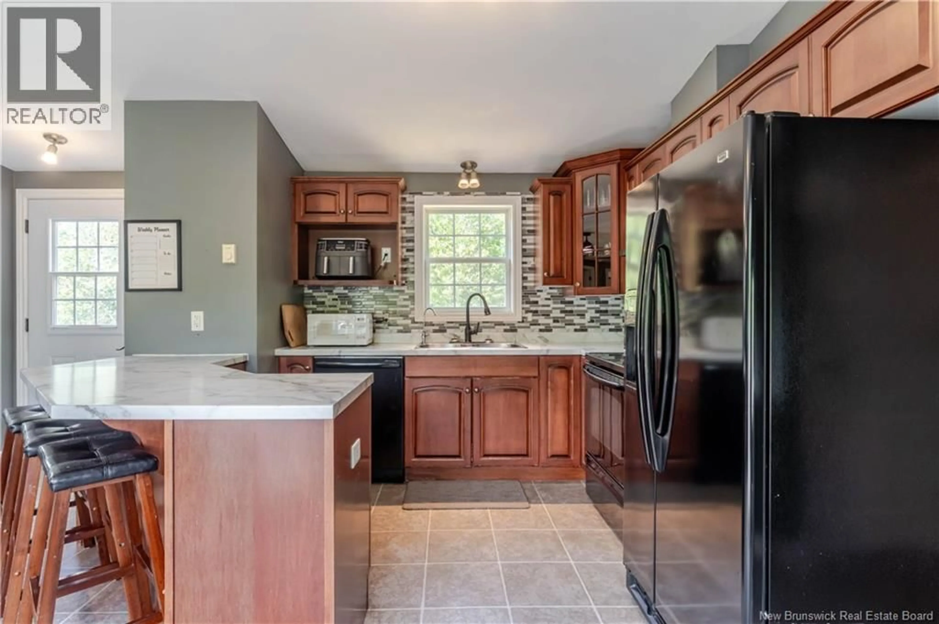 Open concept kitchen, ceramic/tile floor for 16 LAWLER STREET, Rusagonis New Brunswick E3B0N5