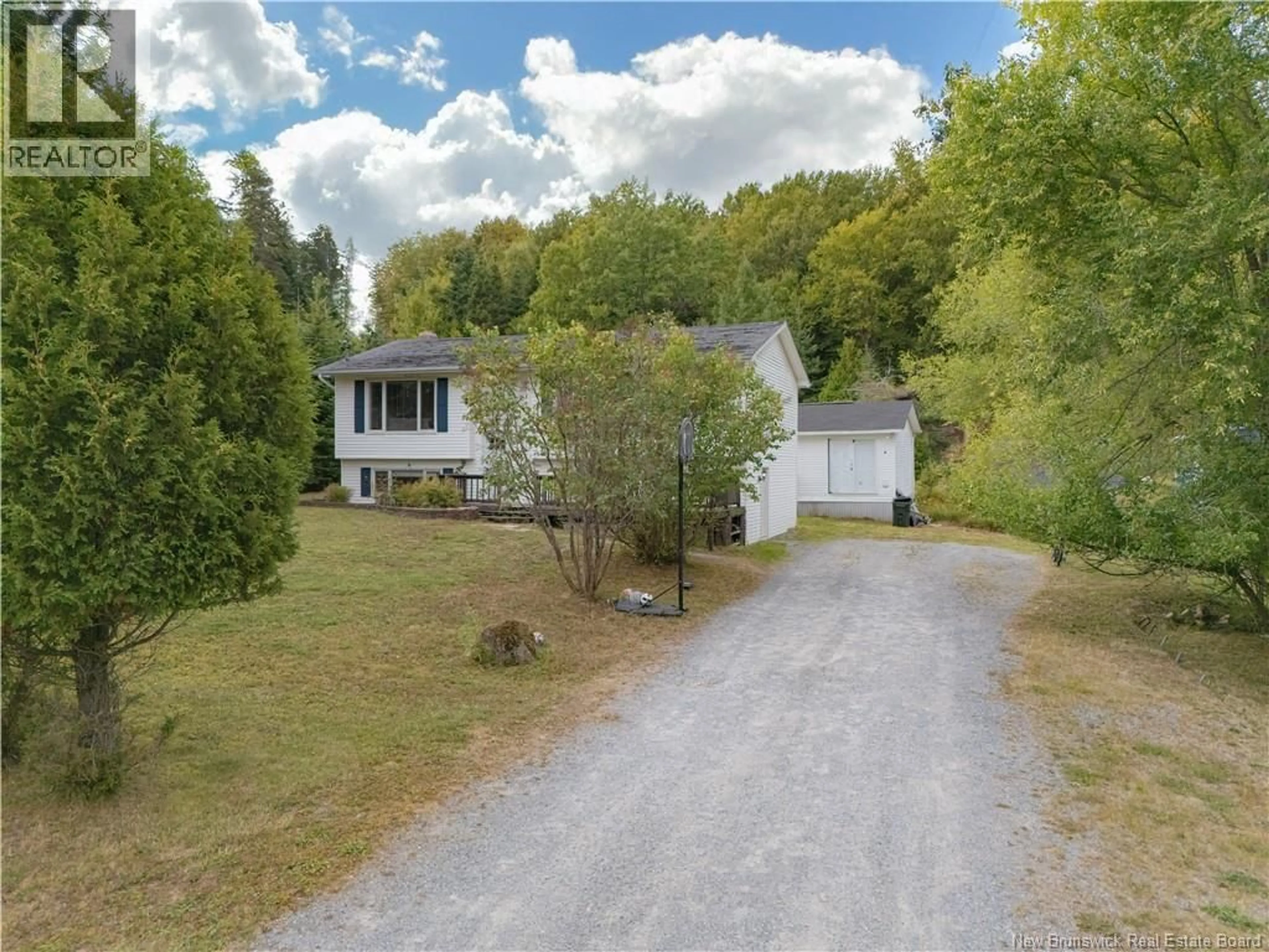 A pic from outside/outdoor area/front of a property/back of a property/a pic from drone, unknown for 13 MEENANS COVE ROAD, Quispamsis New Brunswick E2E1M7