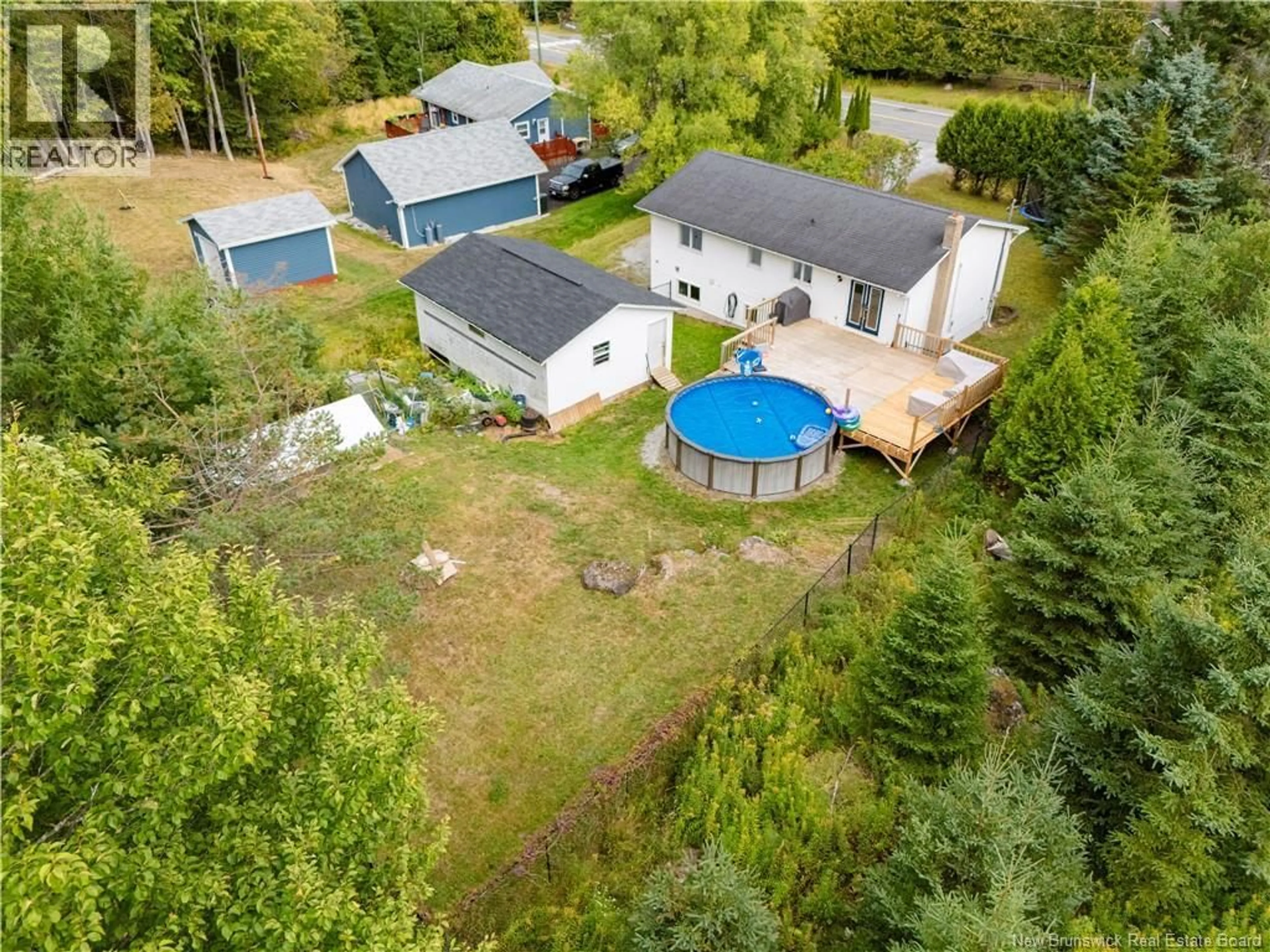 A pic from outside/outdoor area/front of a property/back of a property/a pic from drone, water/lake/river/ocean view for 13 MEENANS COVE ROAD, Quispamsis New Brunswick E2E1M7
