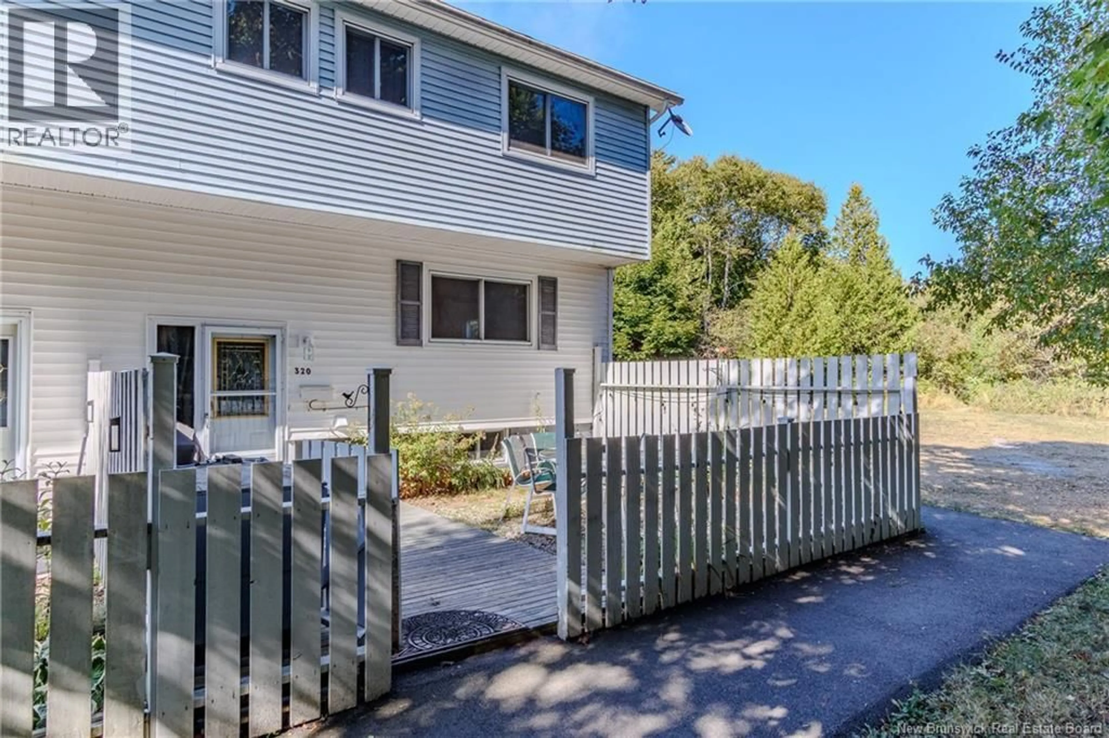 A pic from outside/outdoor area/front of a property/back of a property/a pic from drone, street for 320 TARTAN STREET, Saint John New Brunswick E2K2R7