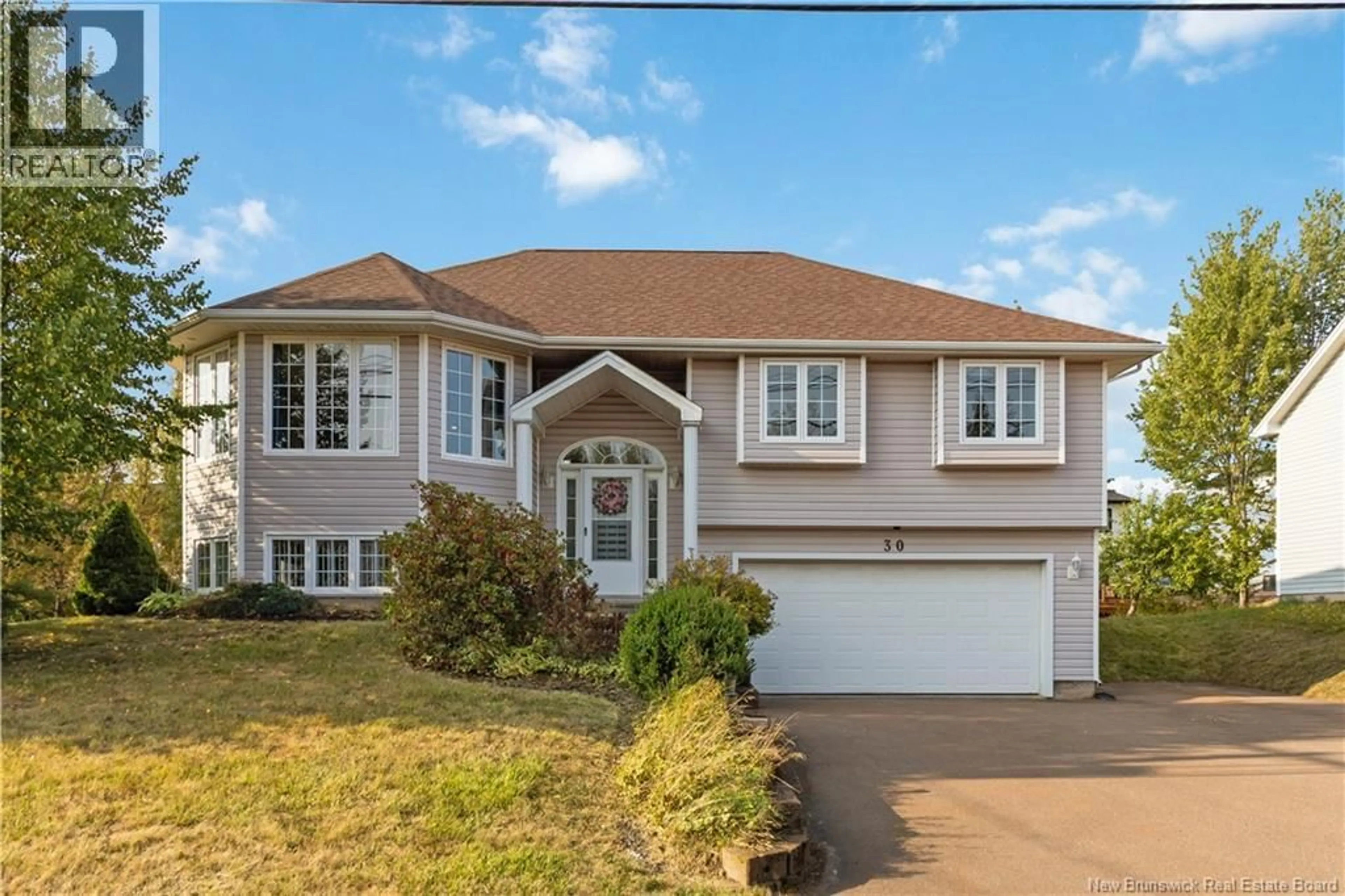 Home with vinyl exterior material, street for 30 PELAGIE STREET, Dieppe New Brunswick E1A7R7