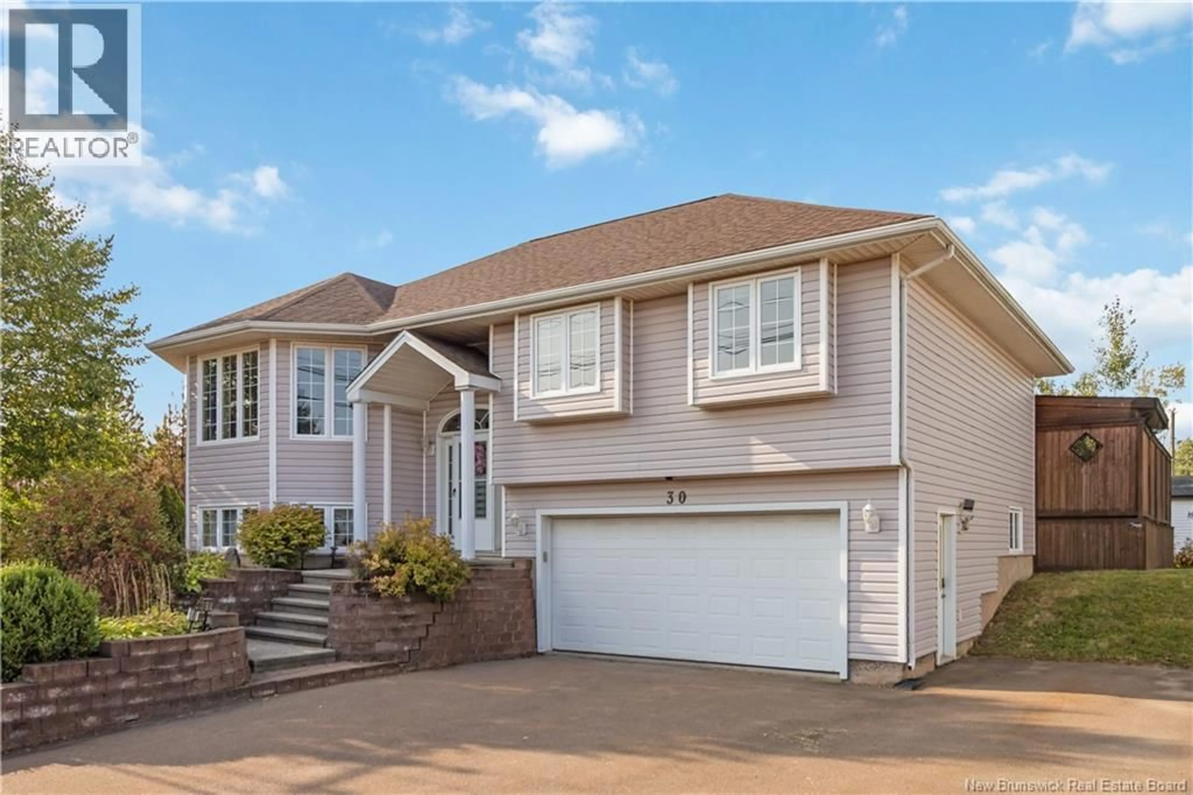 Home with vinyl exterior material, street for 30 PELAGIE STREET, Dieppe New Brunswick E1A7R7