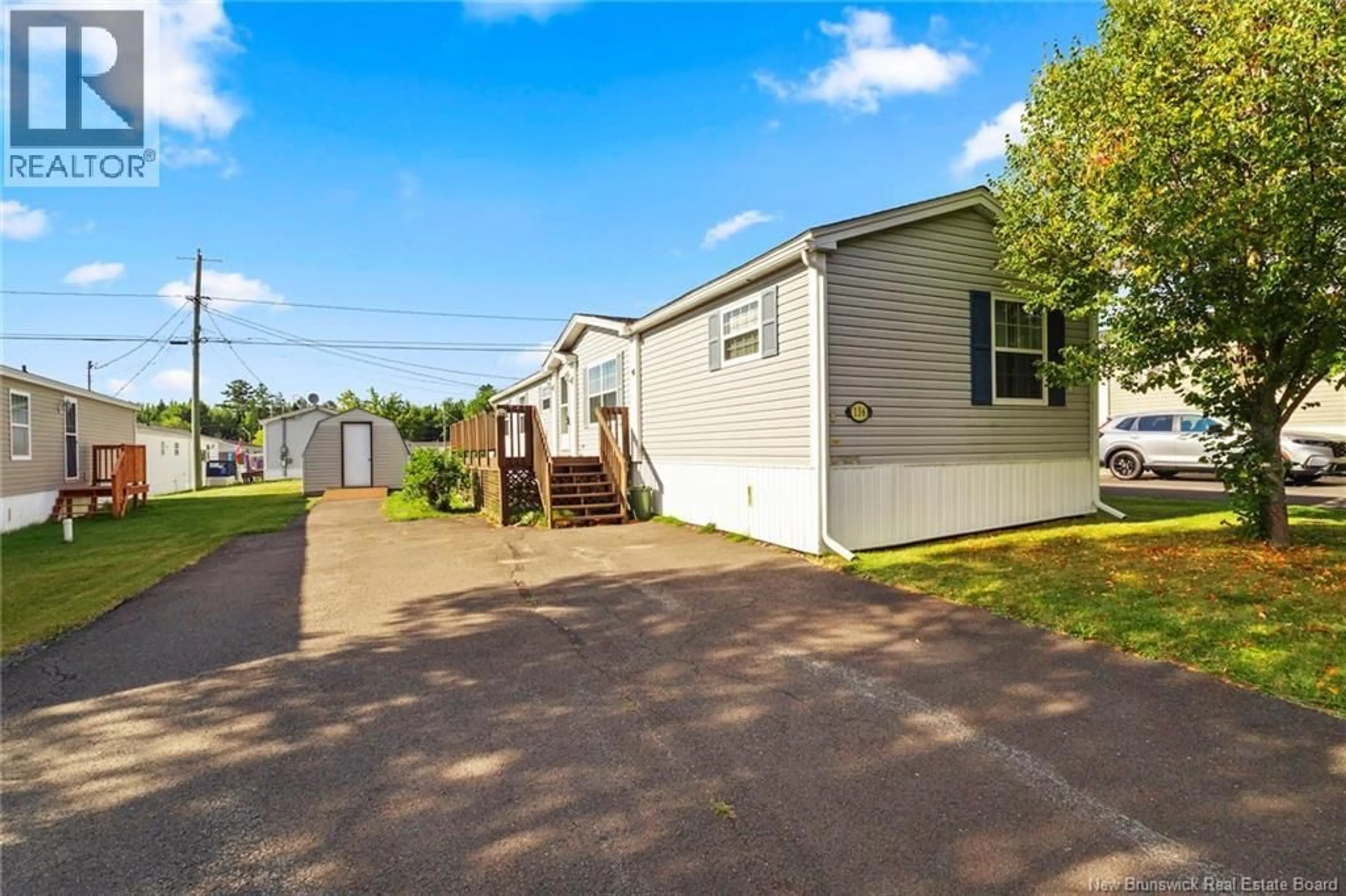 A pic from outside/outdoor area/front of a property/back of a property/a pic from drone, street for 136 GLENMAR DRIVE, Fredericton New Brunswick E3A0S4