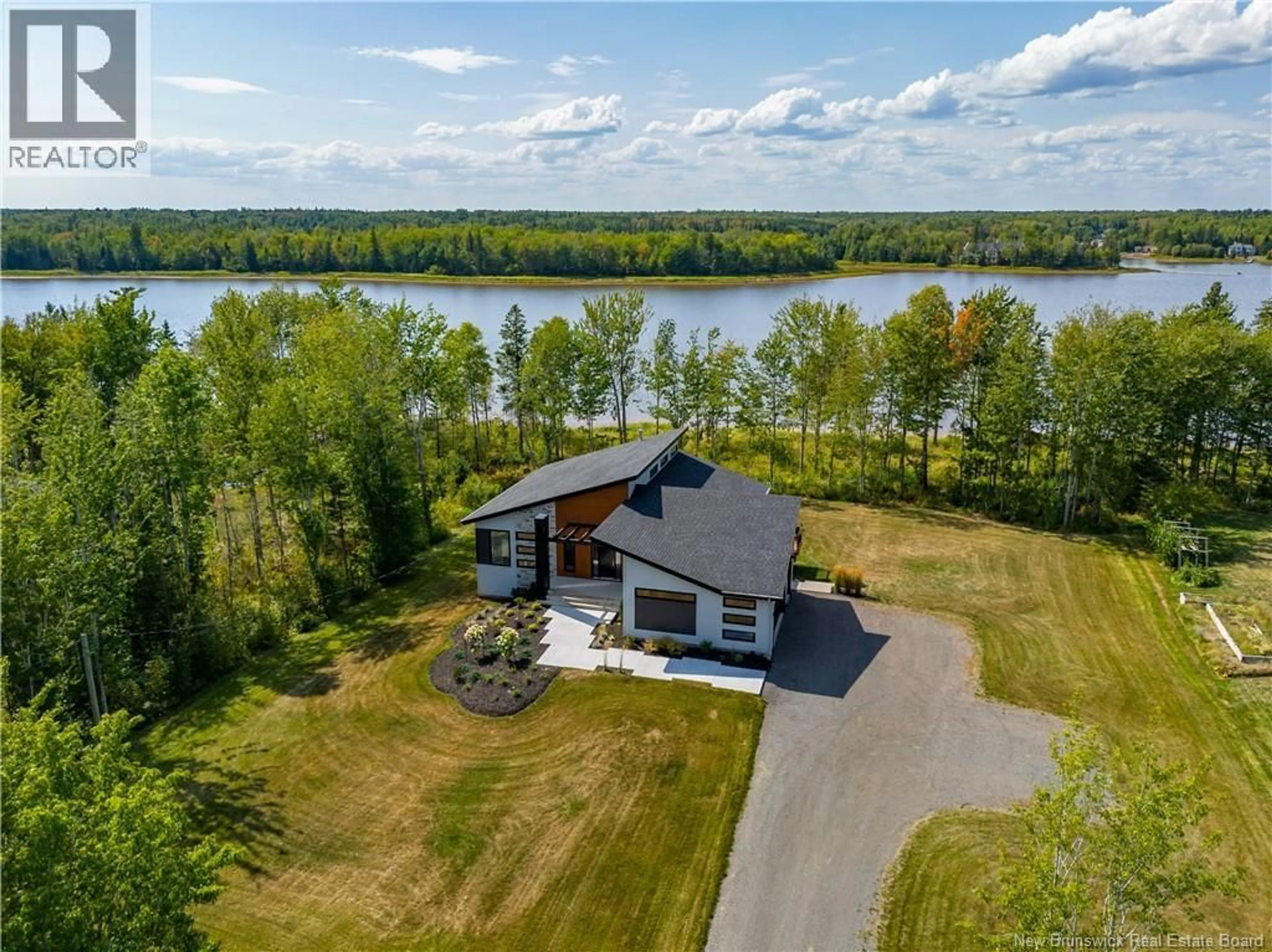 A pic from outside/outdoor area/front of a property/back of a property/a pic from drone, water/lake/river/ocean view for 331 POINTE-A-NICET, Grand-Barachois New Brunswick E4P8Z7