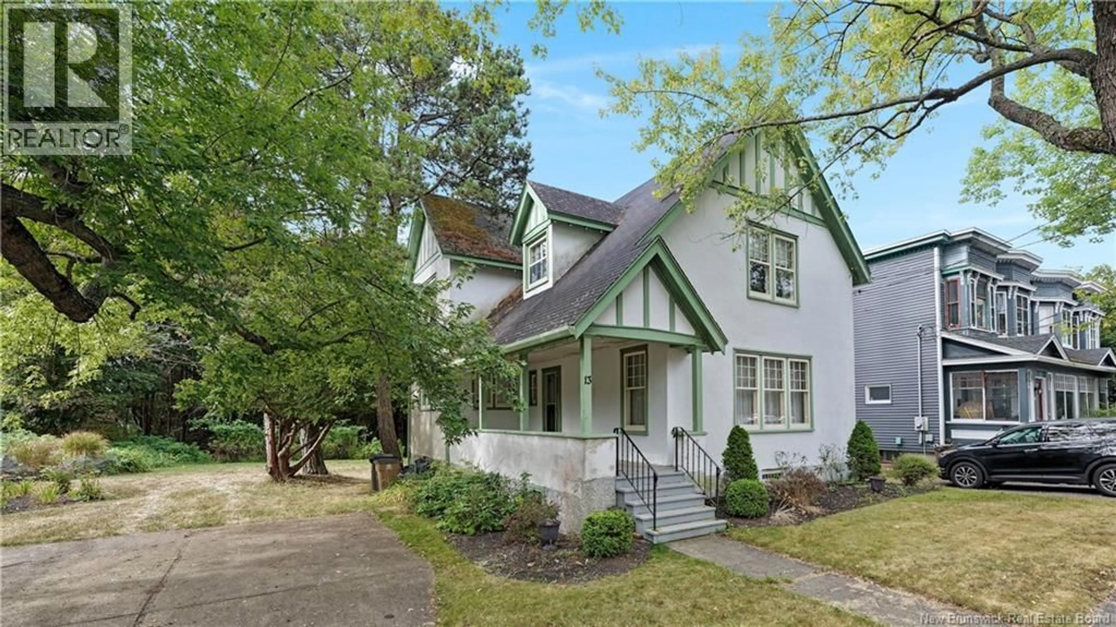 Home with vinyl exterior material, street for 13 BRUNSWICK PLACE, Saint John New Brunswick E2K1B5