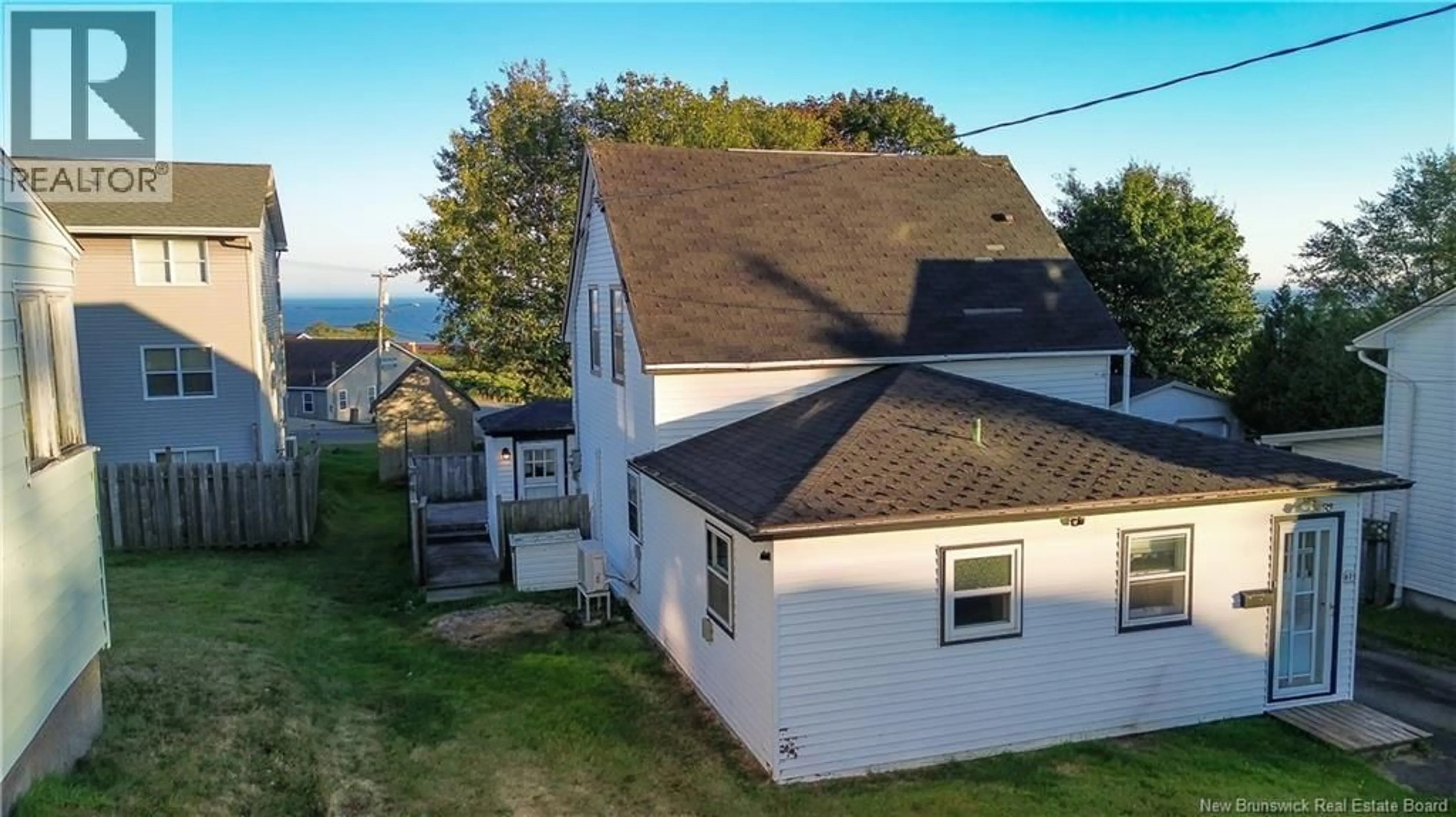 A pic from outside/outdoor area/front of a property/back of a property/a pic from drone, unknown for 471 PLEASANT STREET, Saint John New Brunswick E2M2P3