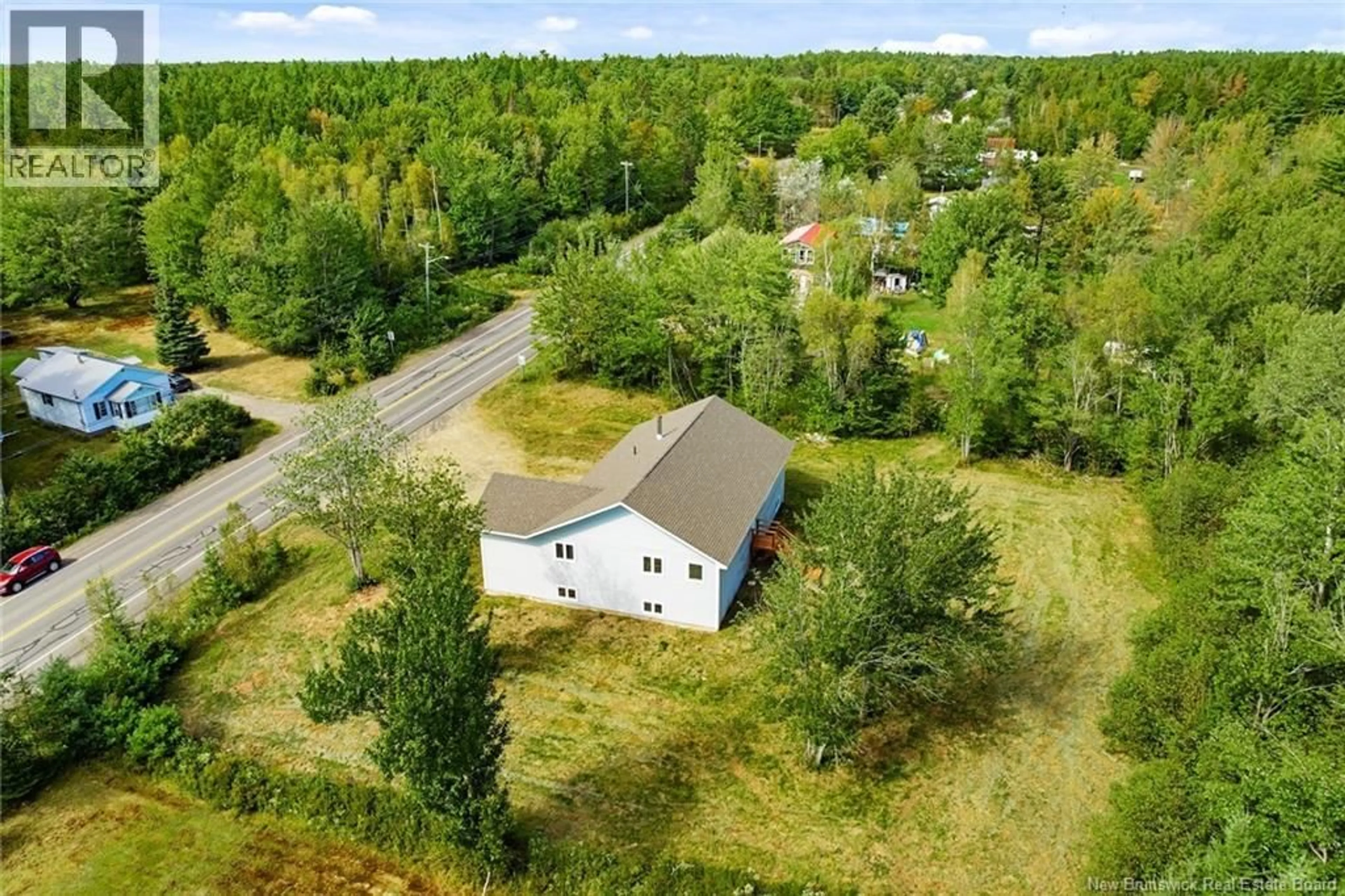 A pic from outside/outdoor area/front of a property/back of a property/a pic from drone, forest/trees view for 912 PLEASANT DRIVE, Minto New Brunswick E4B2V5