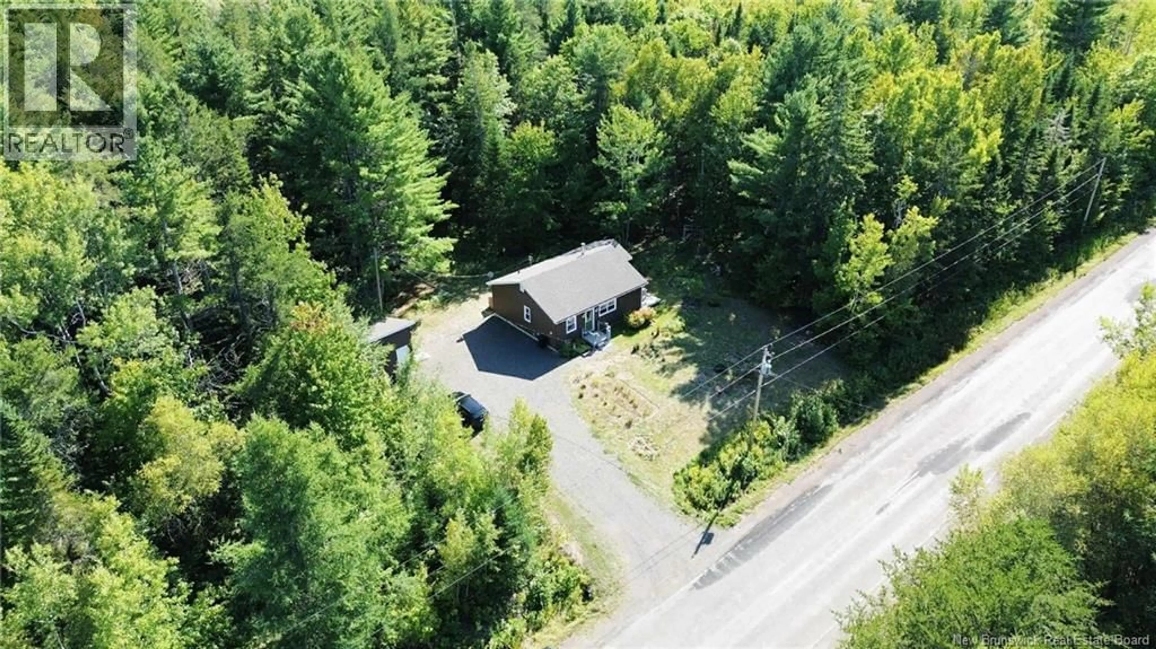 A pic from outside/outdoor area/front of a property/back of a property/a pic from drone, unknown for 145 ROUTE 480, Canisto New Brunswick E4X1N7