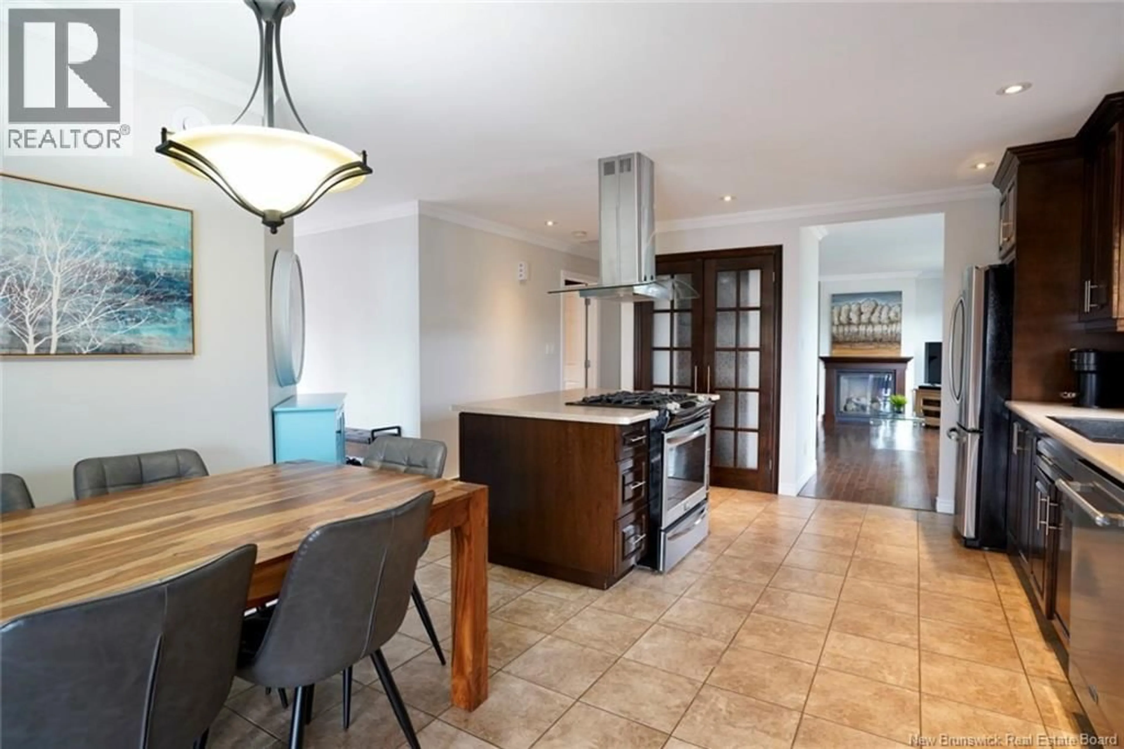Open concept kitchen, ceramic/tile floor for 1174 RUE PRINCIPALE, Beresford New Brunswick E8K2J1