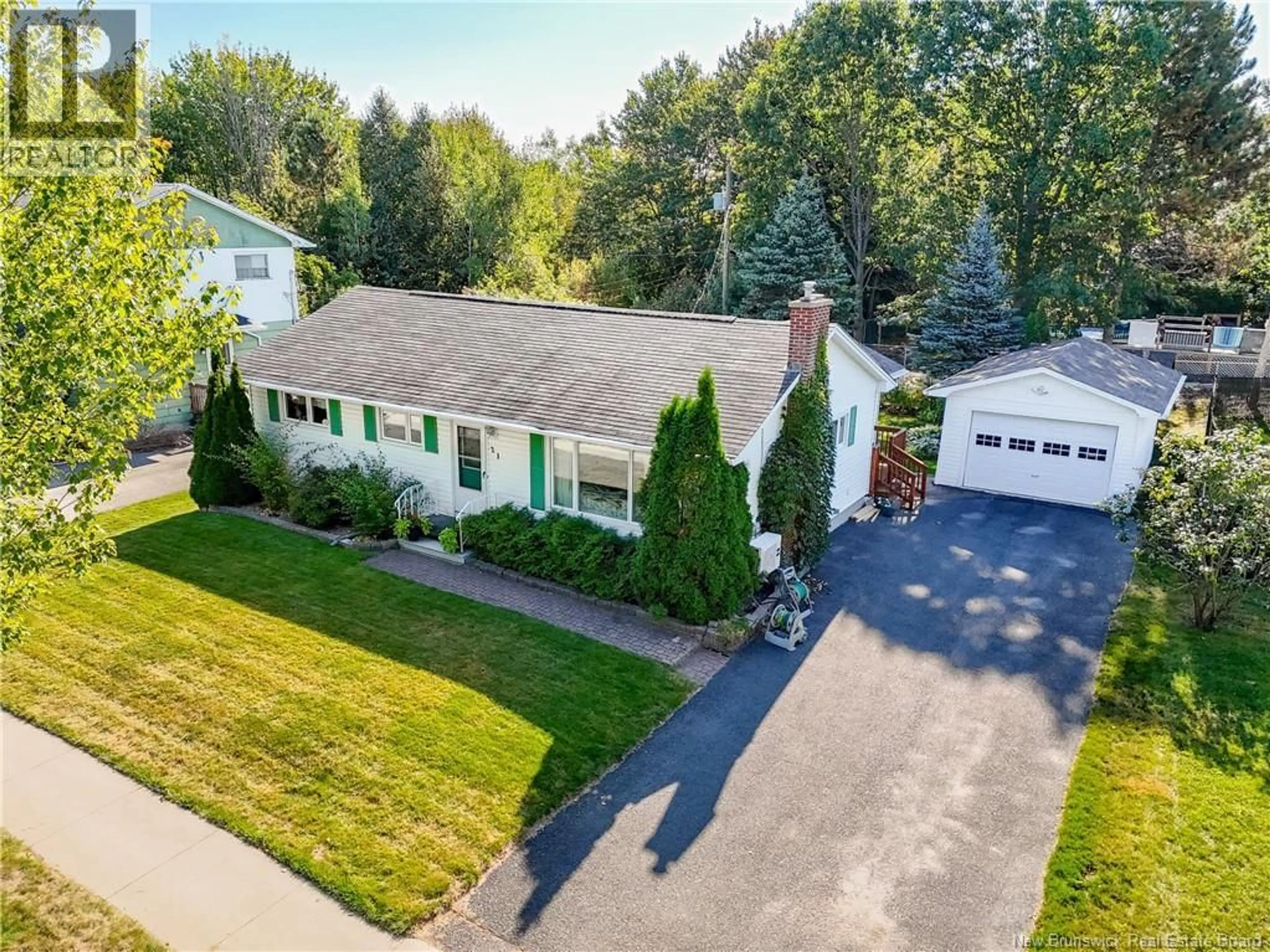 A pic from outside/outdoor area/front of a property/back of a property/a pic from drone, street for 21 DOVER CRESCENT, Fredericton New Brunswick E3B4T8