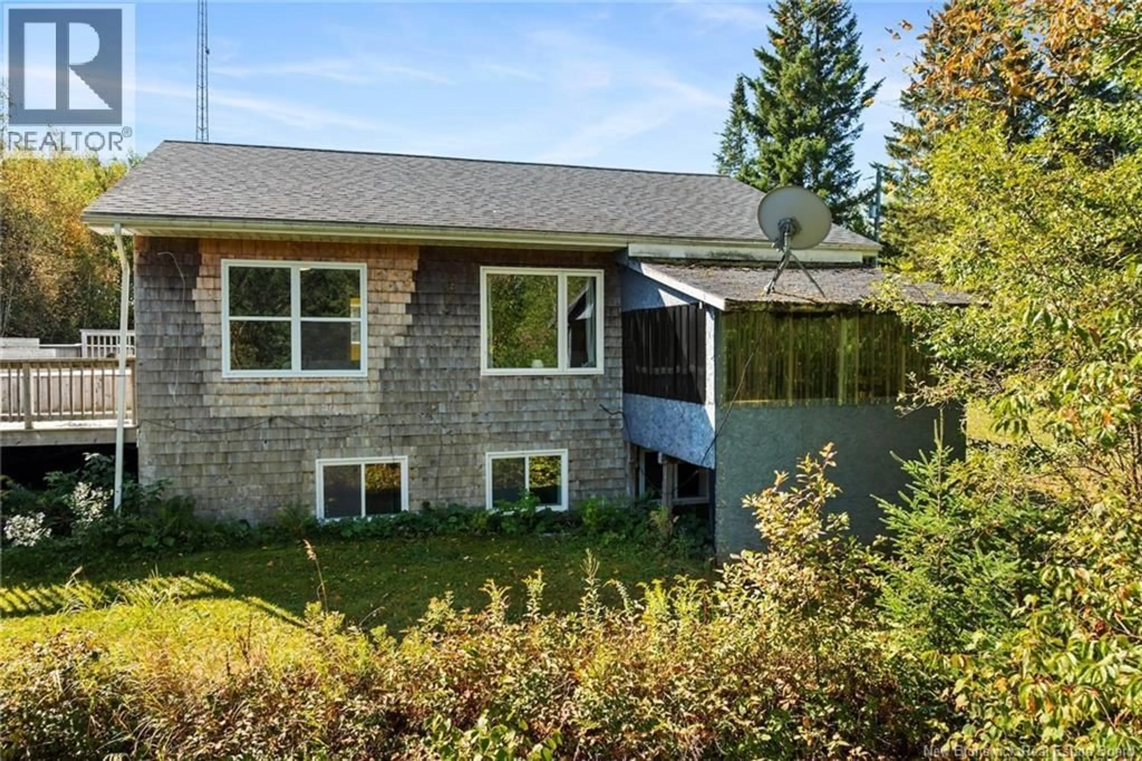 Home with vinyl exterior material, street for 29 ROUTE 116, Upper Salmon Creek New Brunswick E4A1J6