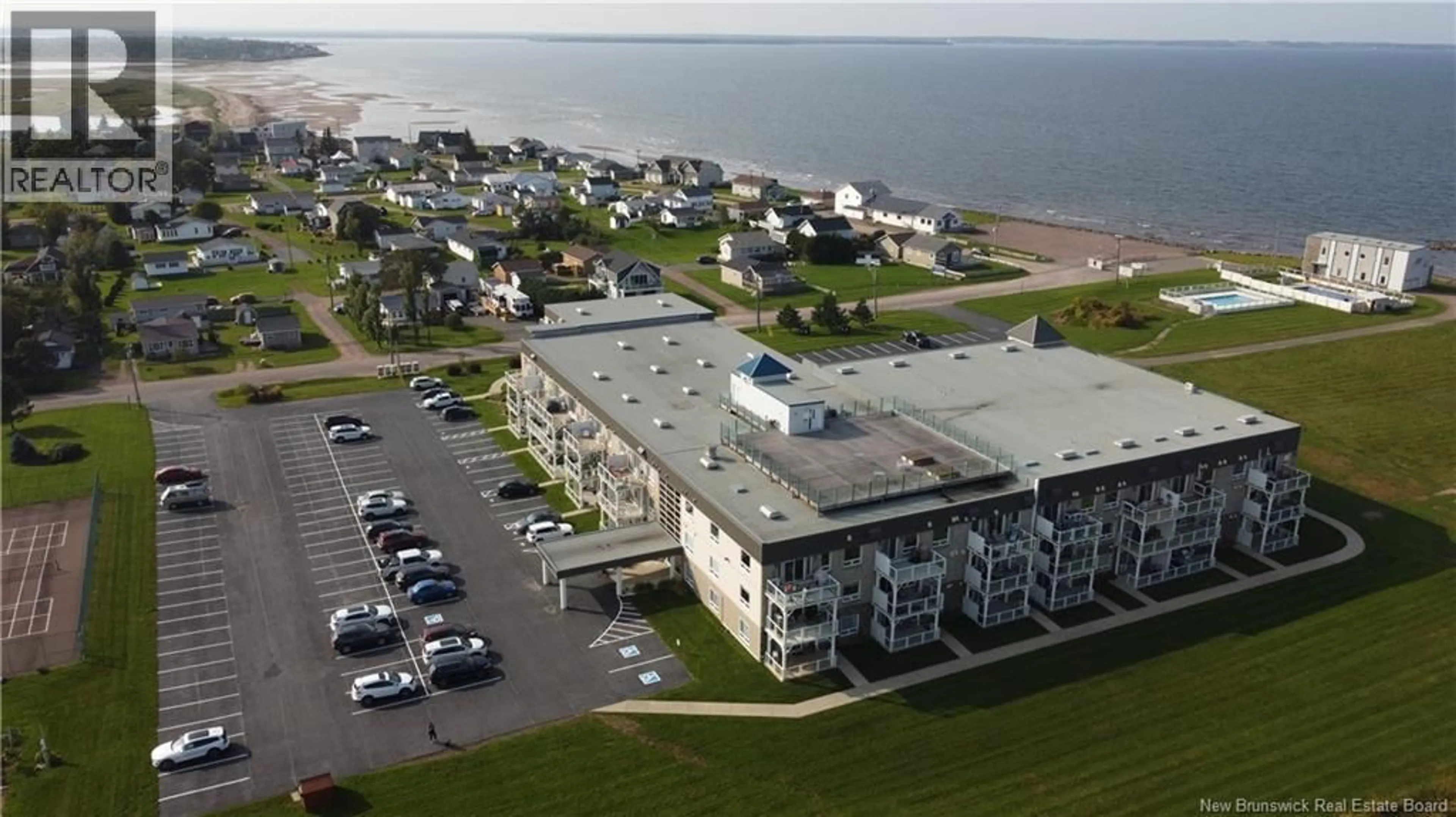 A pic from outside/outdoor area/front of a property/back of a property/a pic from drone, water/lake/river/ocean view for 219 - 69 CAP BIMET BOULEVARD, Grand-Barachois New Brunswick E4P6X5