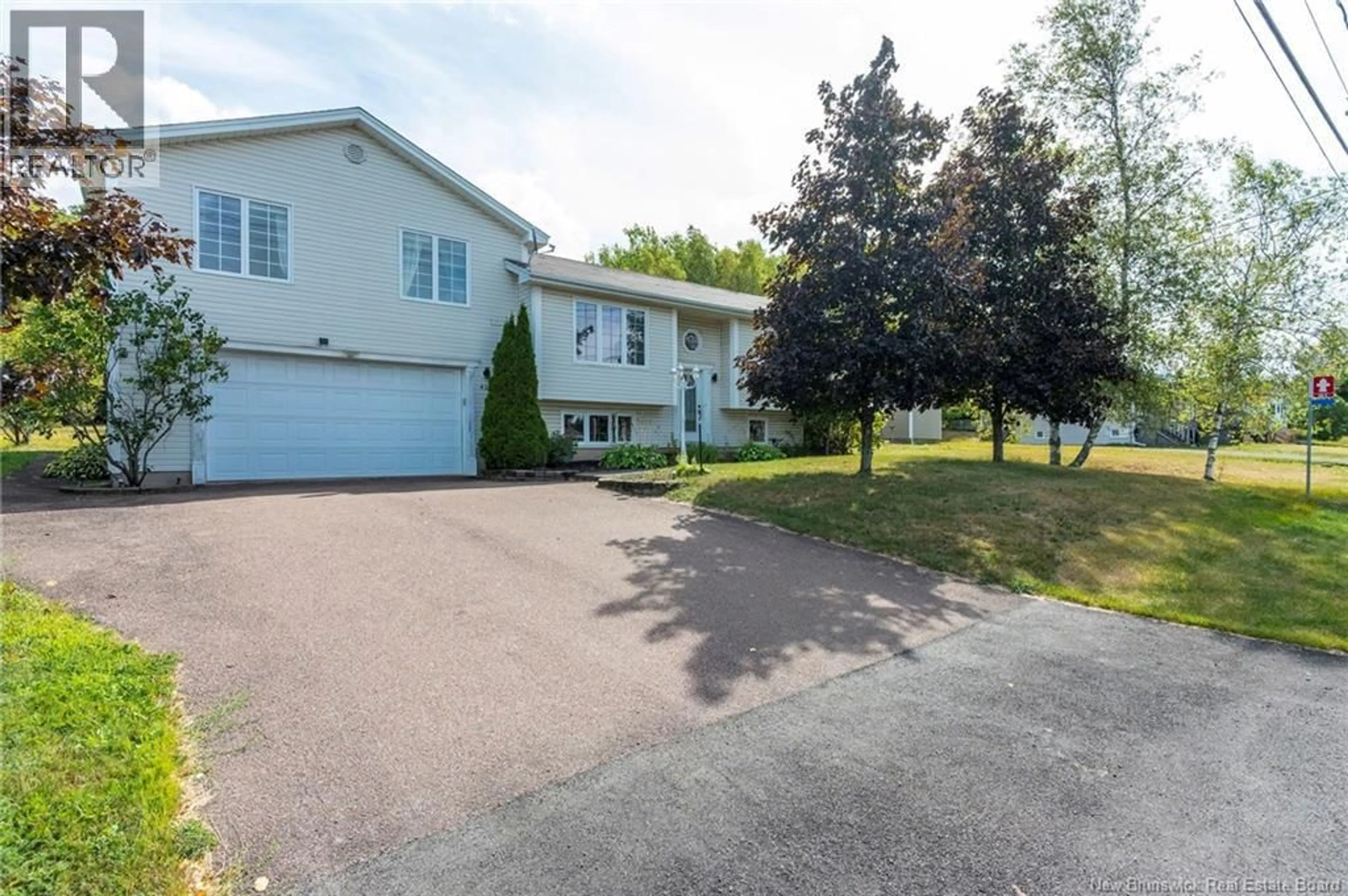 A pic from outside/outdoor area/front of a property/back of a property/a pic from drone, street for 434 FOX CREEK ROAD, Dieppe New Brunswick E1A7M7