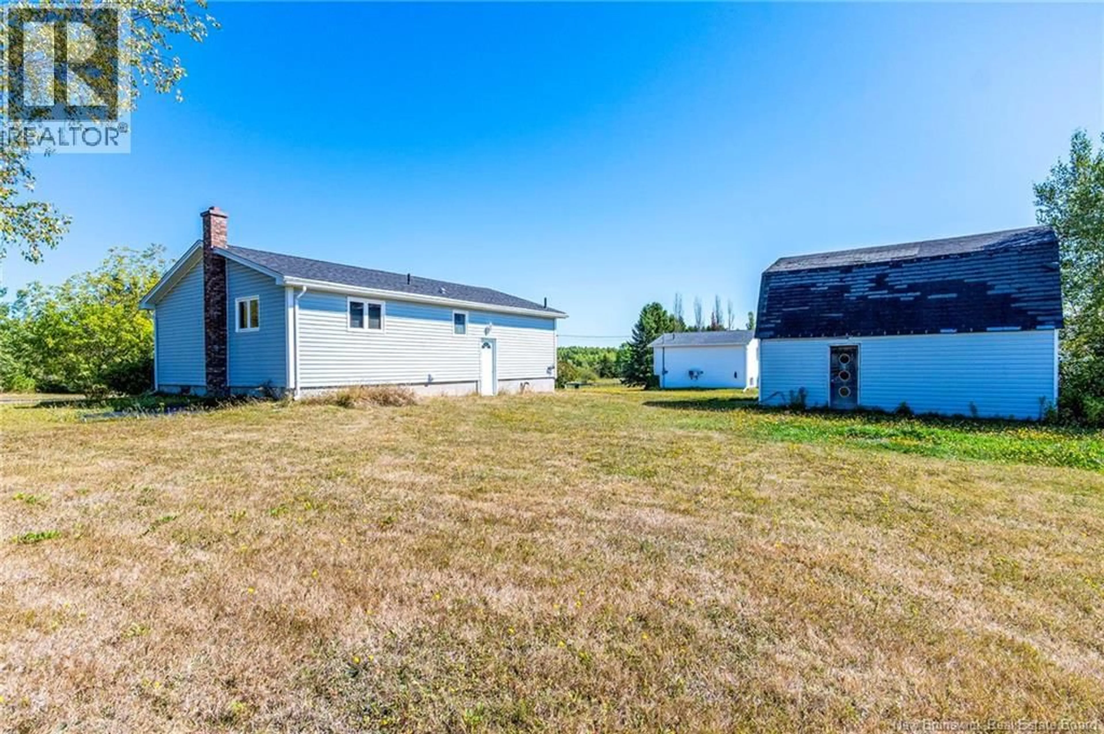 A pic from outside/outdoor area/front of a property/back of a property/a pic from drone, water/lake/river/ocean view for 86 BOIS JOLI STREET, Bouctouche New Brunswick E4S2W9