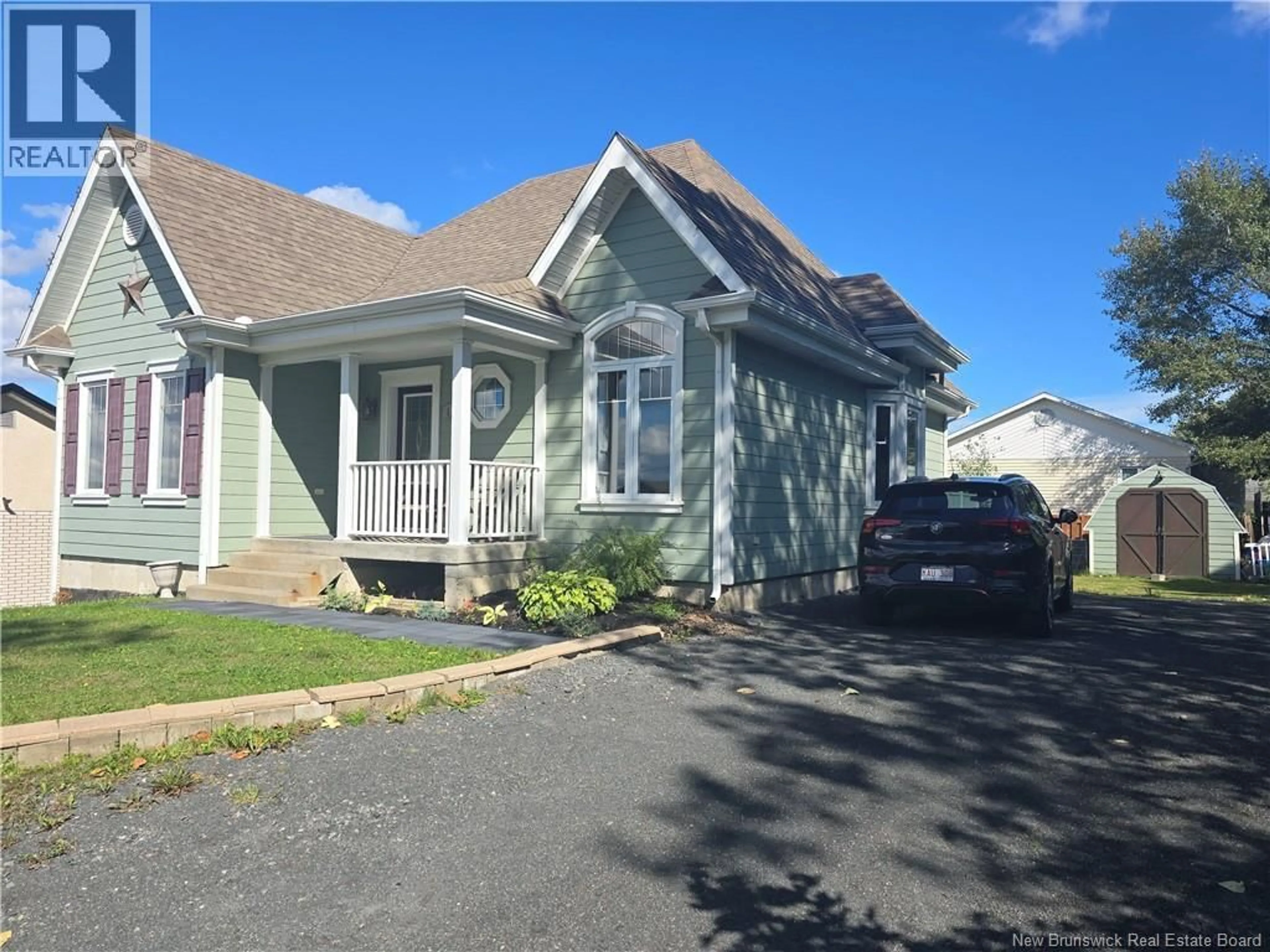 Home with vinyl exterior material, street for 207 BAY LANE, Dalhousie New Brunswick E8C1C7