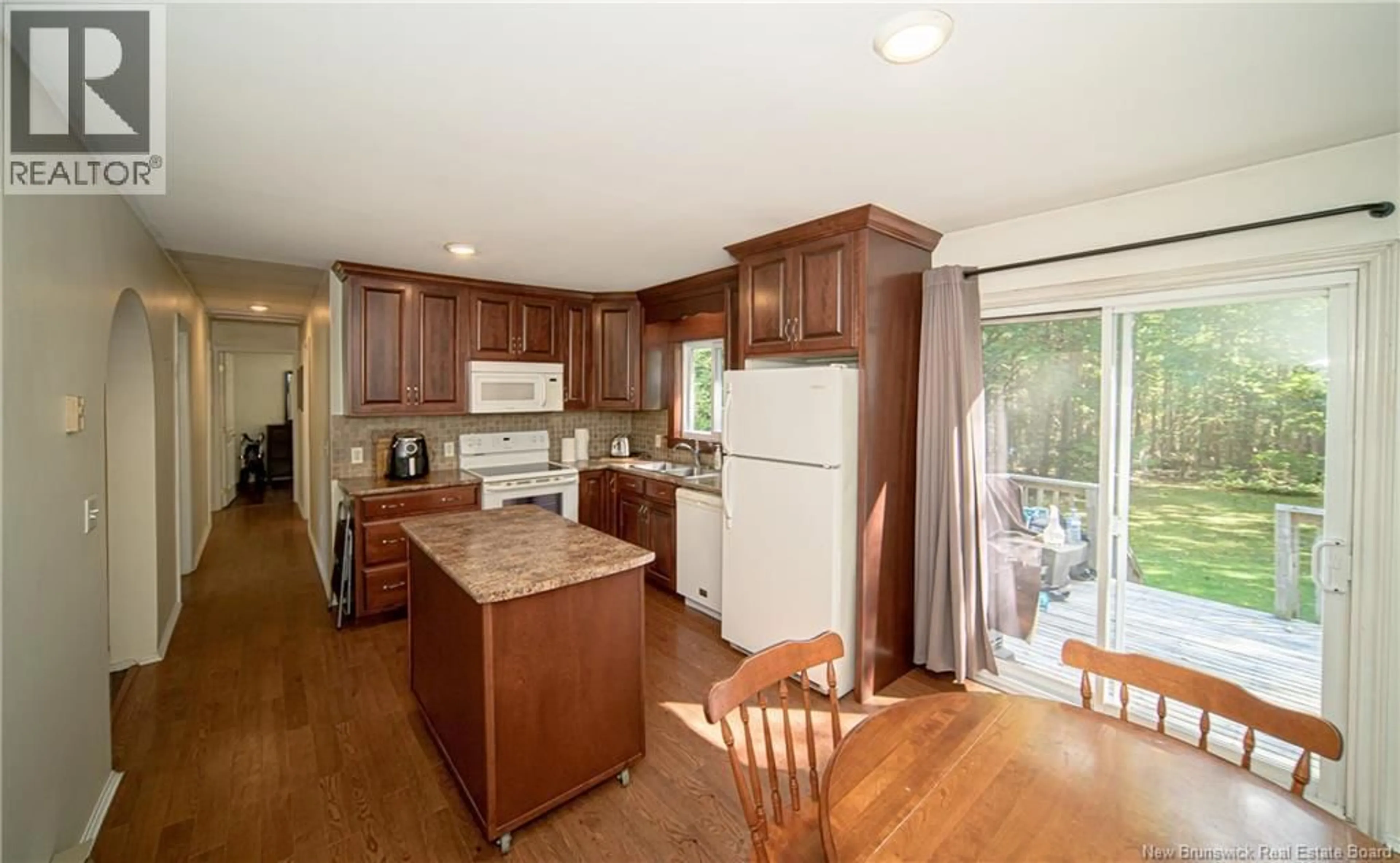 Open concept kitchen, wood/laminate floor for 12 GARY DRIVE, Burton New Brunswick E2V3H2