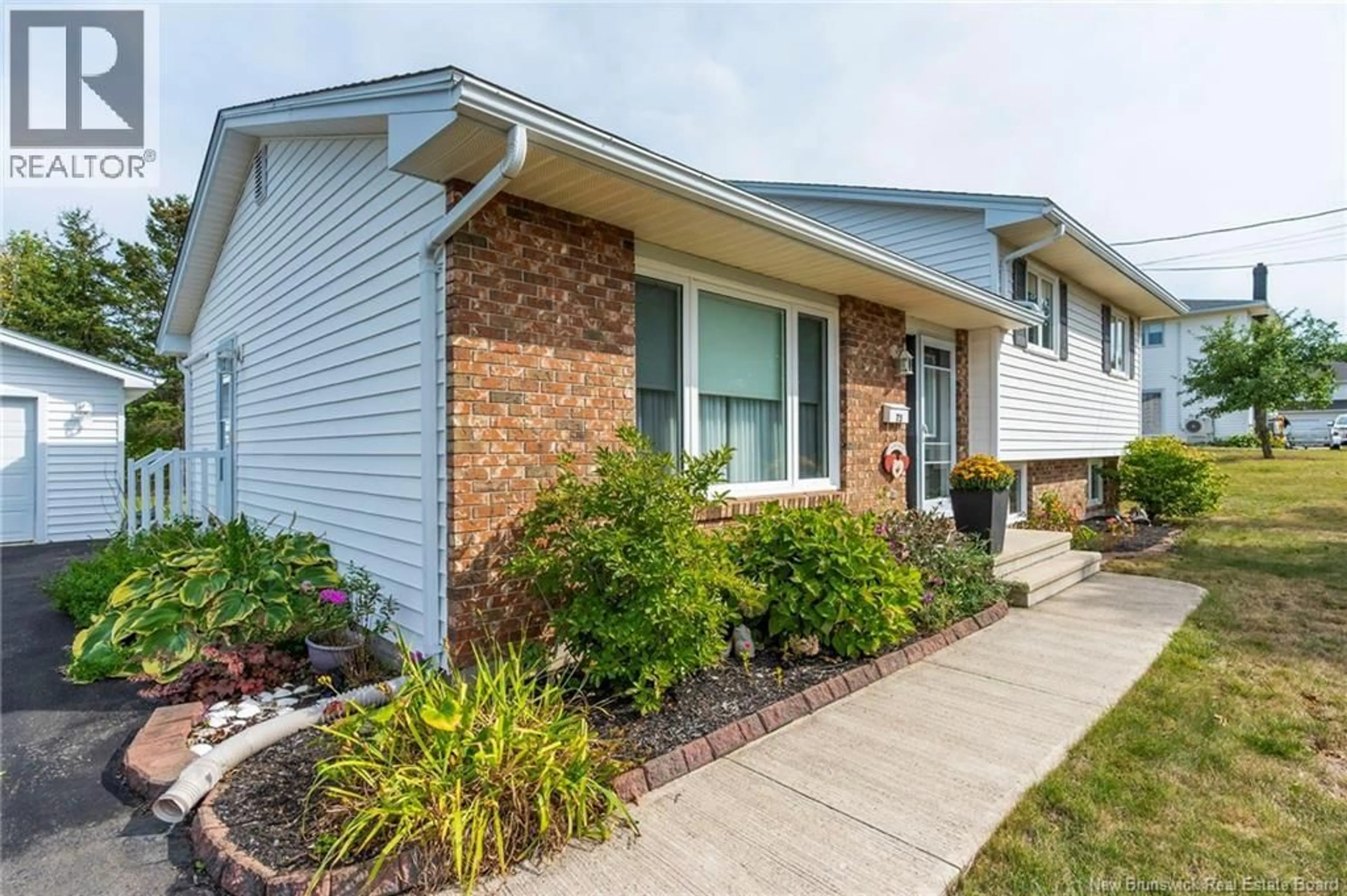 Home with vinyl exterior material, street for 73 REDWATER DRIVE, Riverview New Brunswick E1B4R7