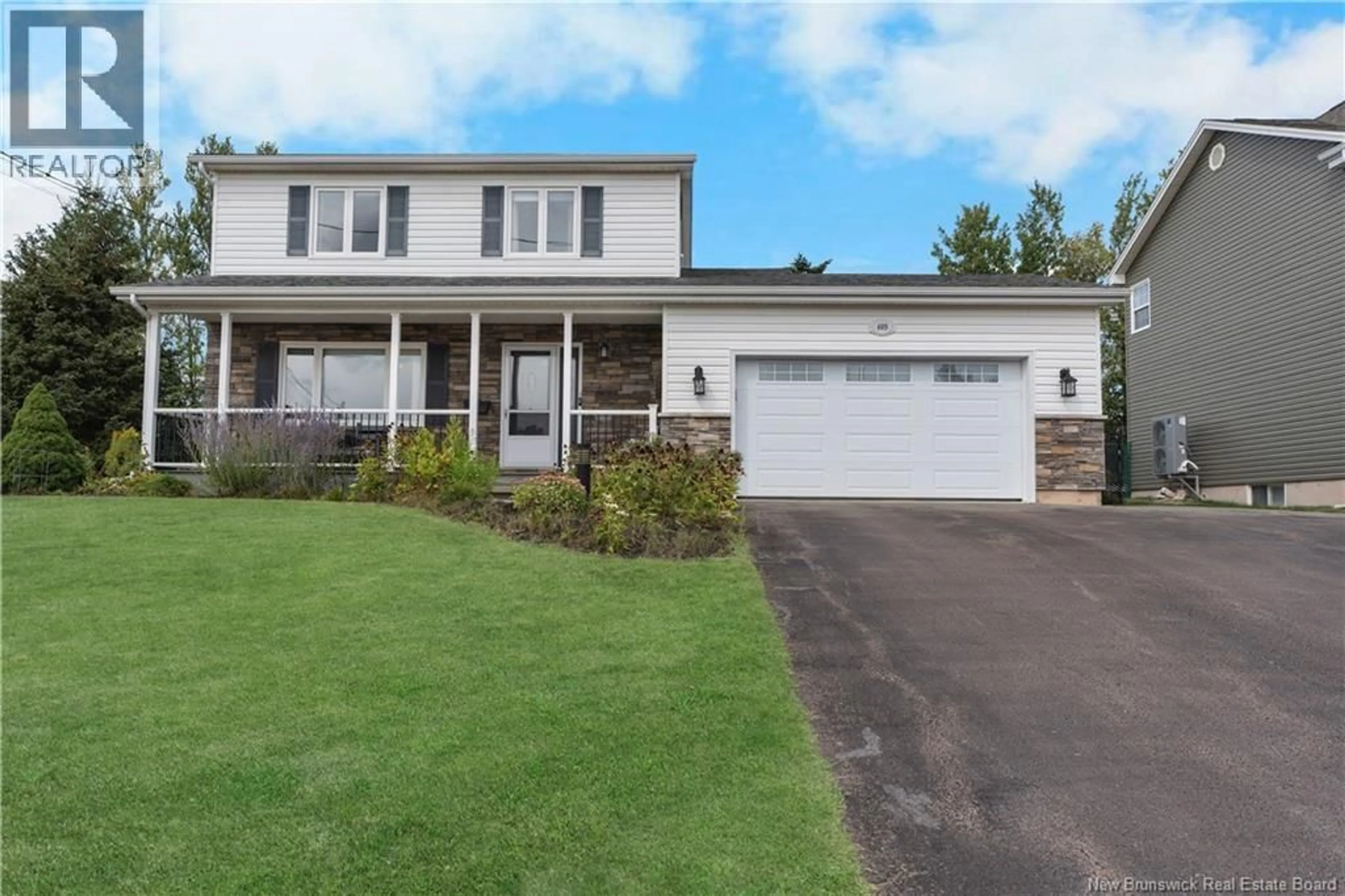 Home with vinyl exterior material, street for 409 GASPE STREET, Dieppe New Brunswick E1A6V8